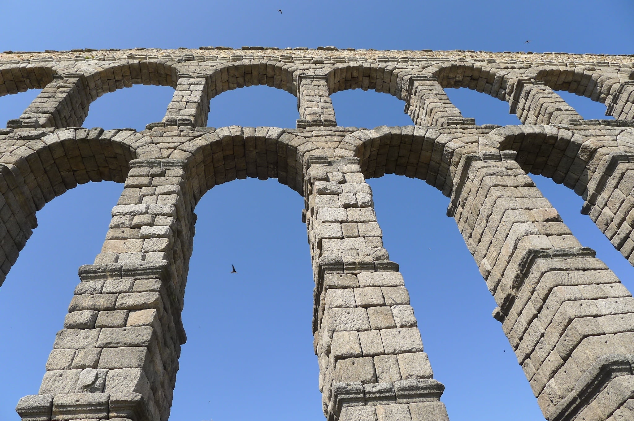 spanish, low angle view, outdoors, travel, no people, aqueduct, archaeology, travel destinations, nature, segovia, day, ruined, ancient, clear sky, history, HD Wallpaper
