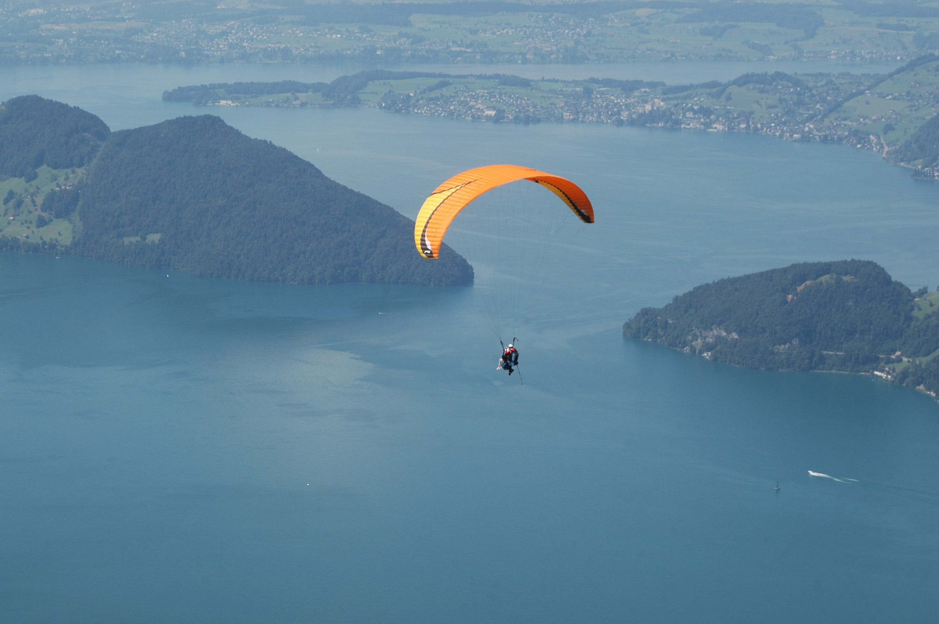 Fly, water, unrecognizable person, Lake, flying, joy, leisure activity, outdoors, extreme sports, 2K, day, real people, adventure, freedom, Landscape, HD Wallpaper