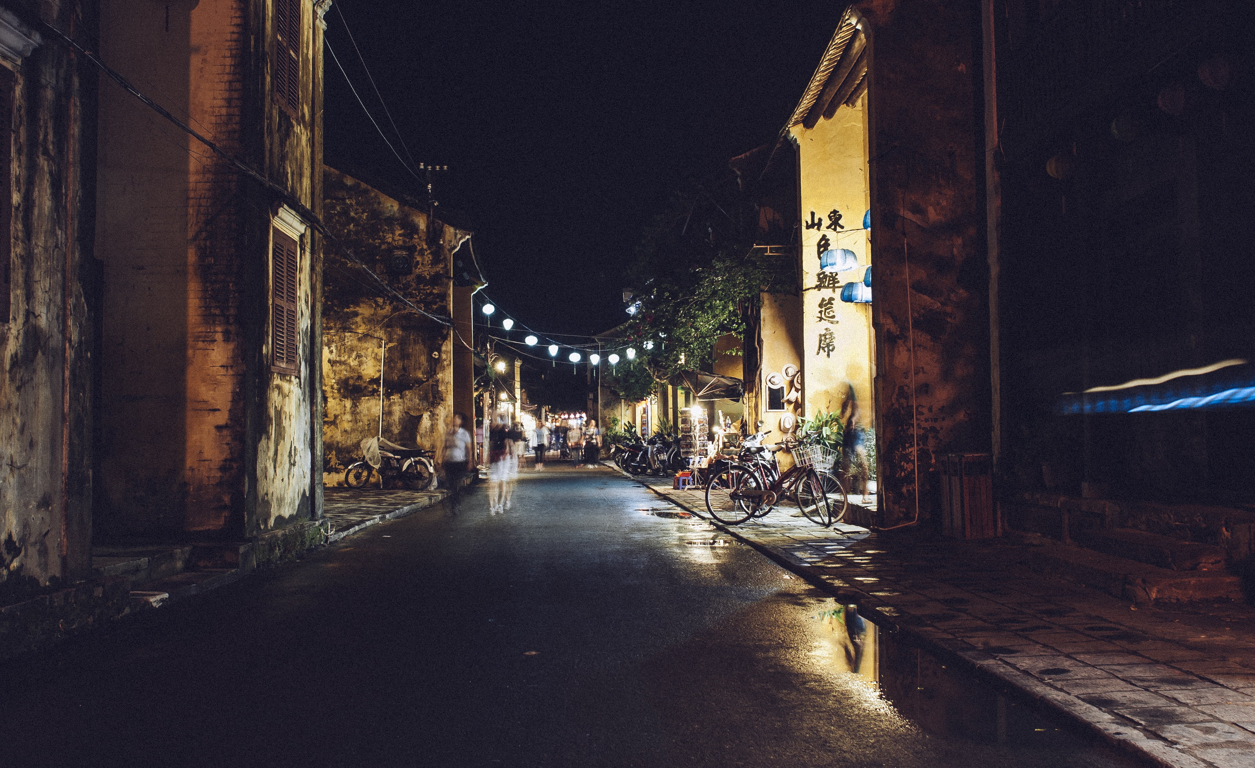 alley, string lights, building exterior, night, dark, people, city, old, puddle, bicycle, shutters, village, asian, architecture, bike, transportation, HD Wallpaper