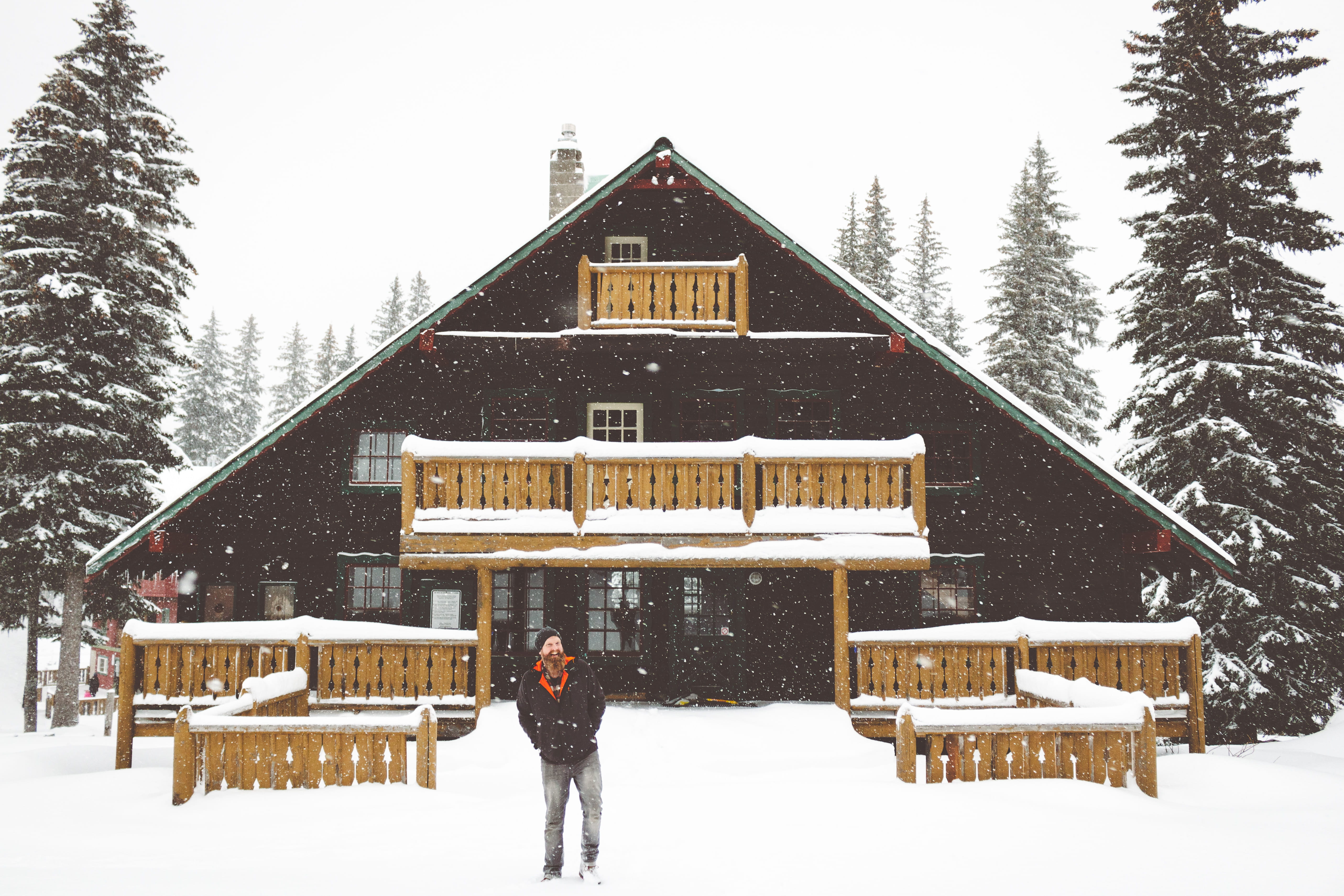 standing, warm clothing, 5K, beauty in nature, structure, beside, tree, nature, white color, forest, full length, man, cold temperature, person, skiing, HD Wallpaper