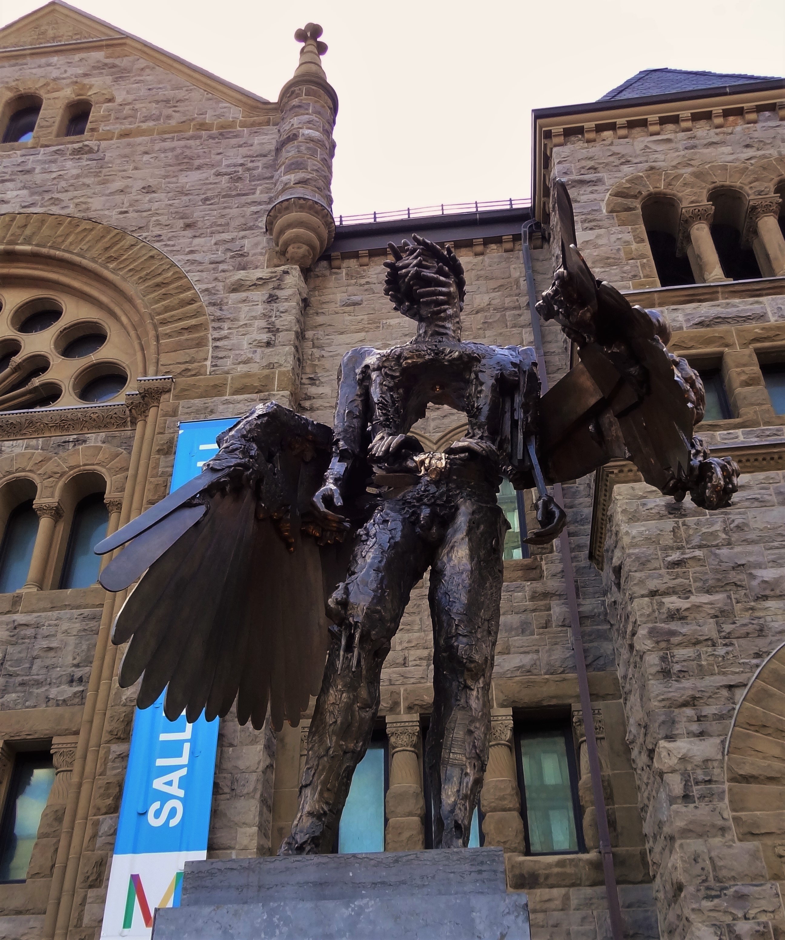 montreal, statue, representation, bronze, quebec, building, the eye, wings, david altmejd, fine arts, sculpture, building exterior, male likeness, belief, Phone HD Wallpaper