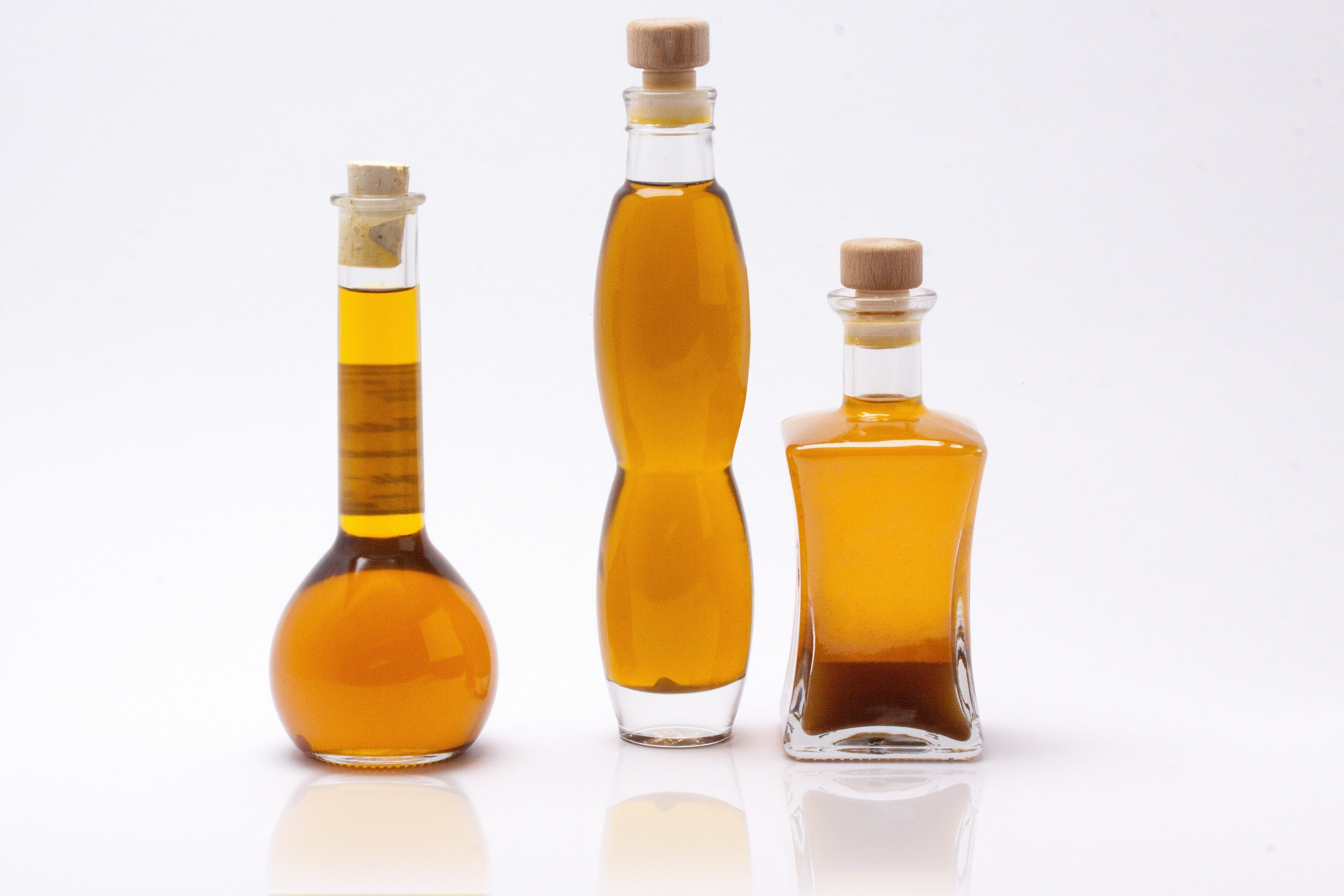 plant, bottles, olive, 4K, white background, natural cosmetics, mirroring, glass - material, food, bottle, therapy, oils, close-up, indoors, herbs, care, HD Wallpaper