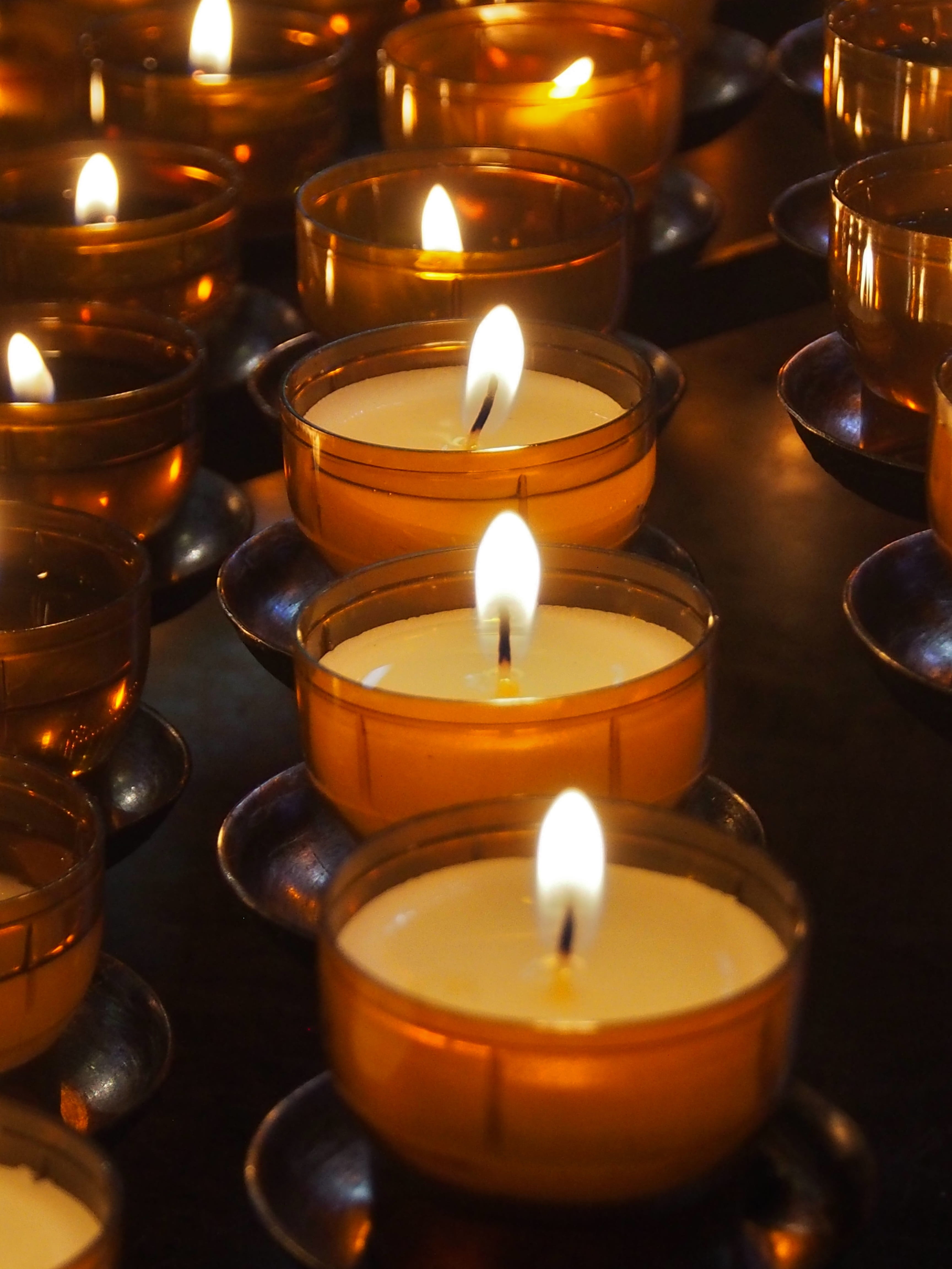 glowing, close-up, lighting equipment, 4K, tea light, fire - natural phenomenon, altar, faith, heat - temperature, large group of objects, burning, place of worship, Phone HD Wallpaper