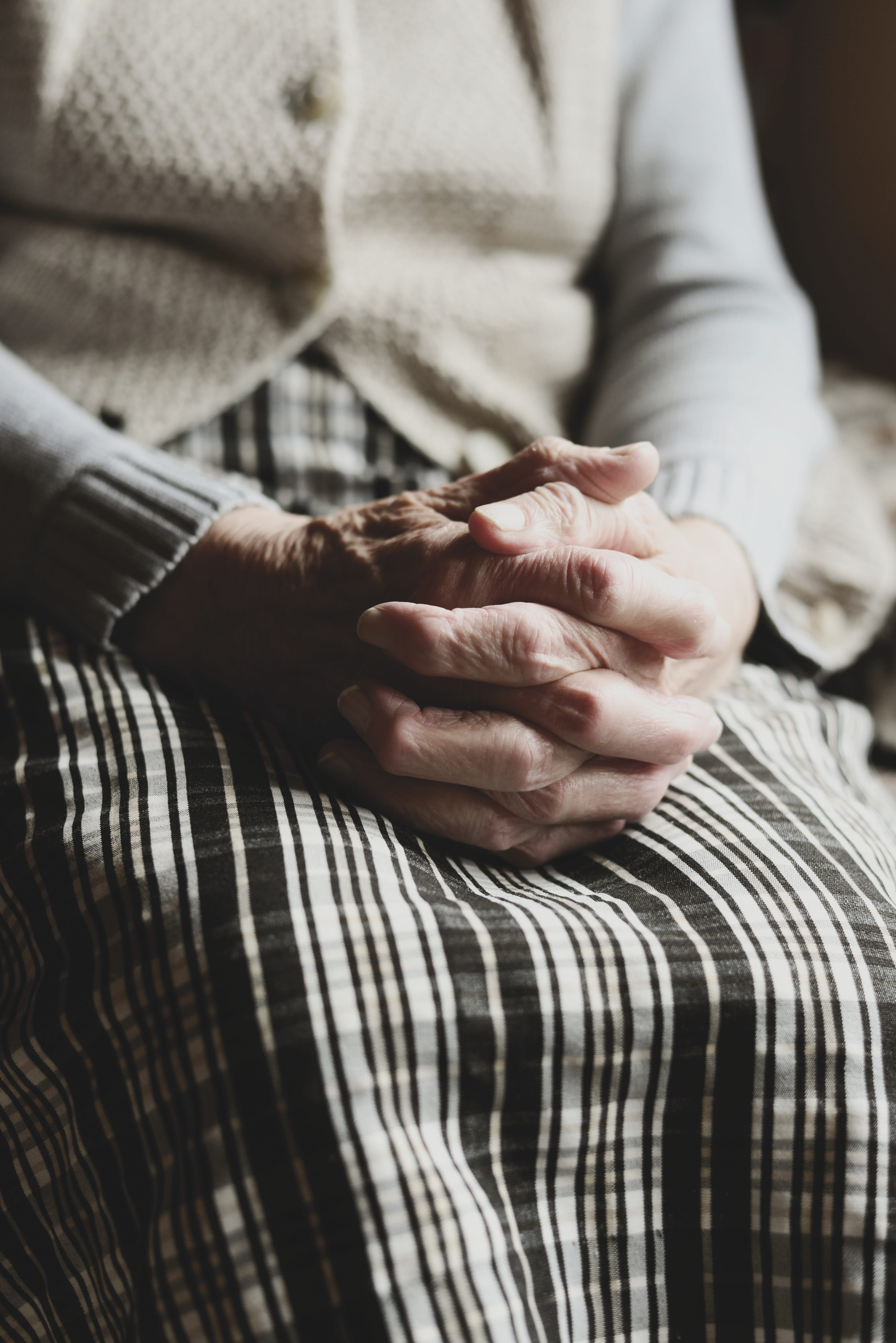 one person, focus on foreground, selective focus, lifestyles, old peoples home, finger, fold, sit, midsection, indoors, art and craft, skin, close-up, pray, Phone HD Wallpaper