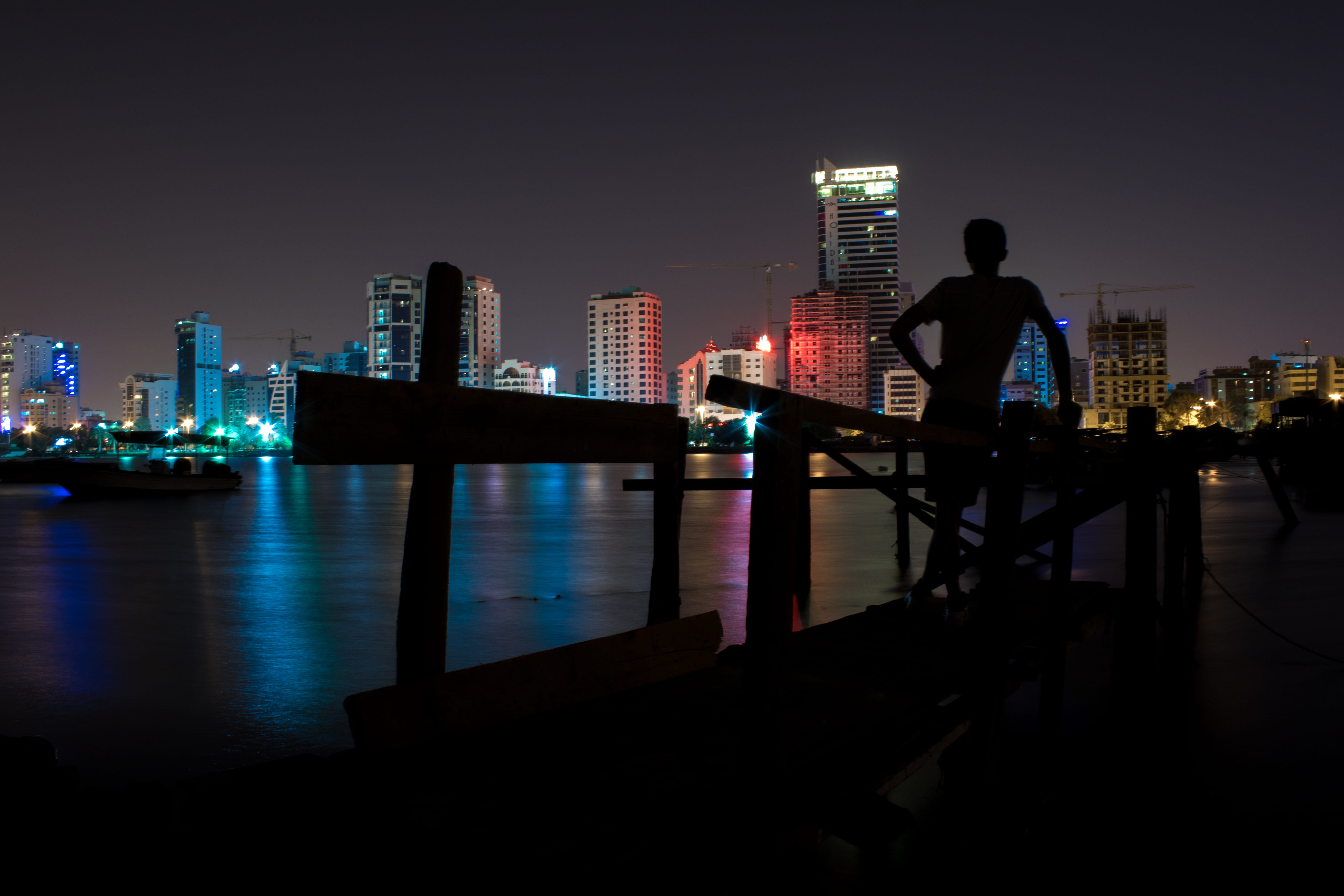 nature, financial district, built structure, railing, sea, real people, one person, town, 5K, architecture, bahrain, skyscraper, illuminated, building, HD Wallpaper