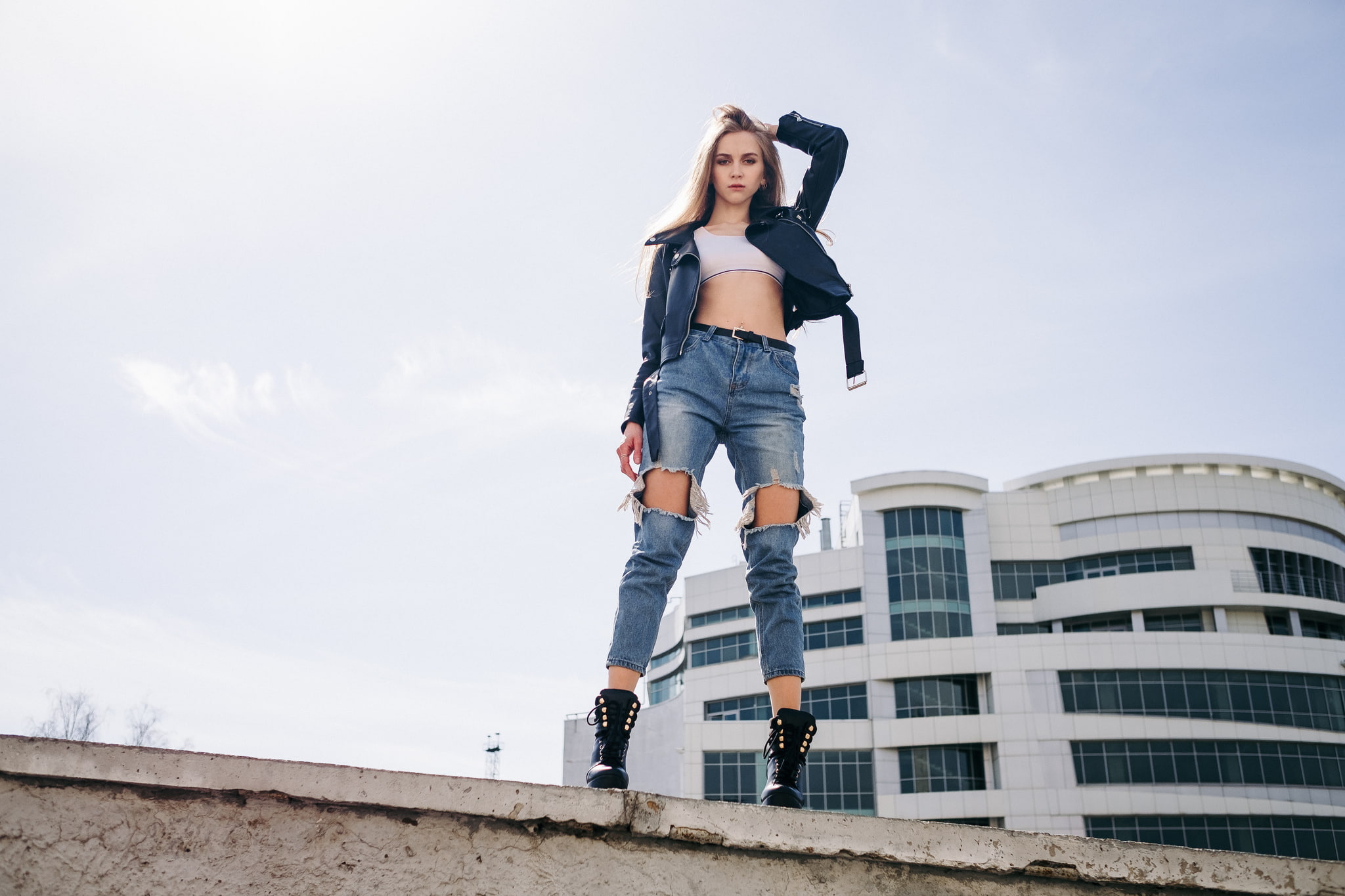 hairstyle, one person, leather jackets, torn jeans, white tops, emotion, boots, front view, looking at viewer, young adult, 1080P, low angle view, arms up, HD Wallpaper