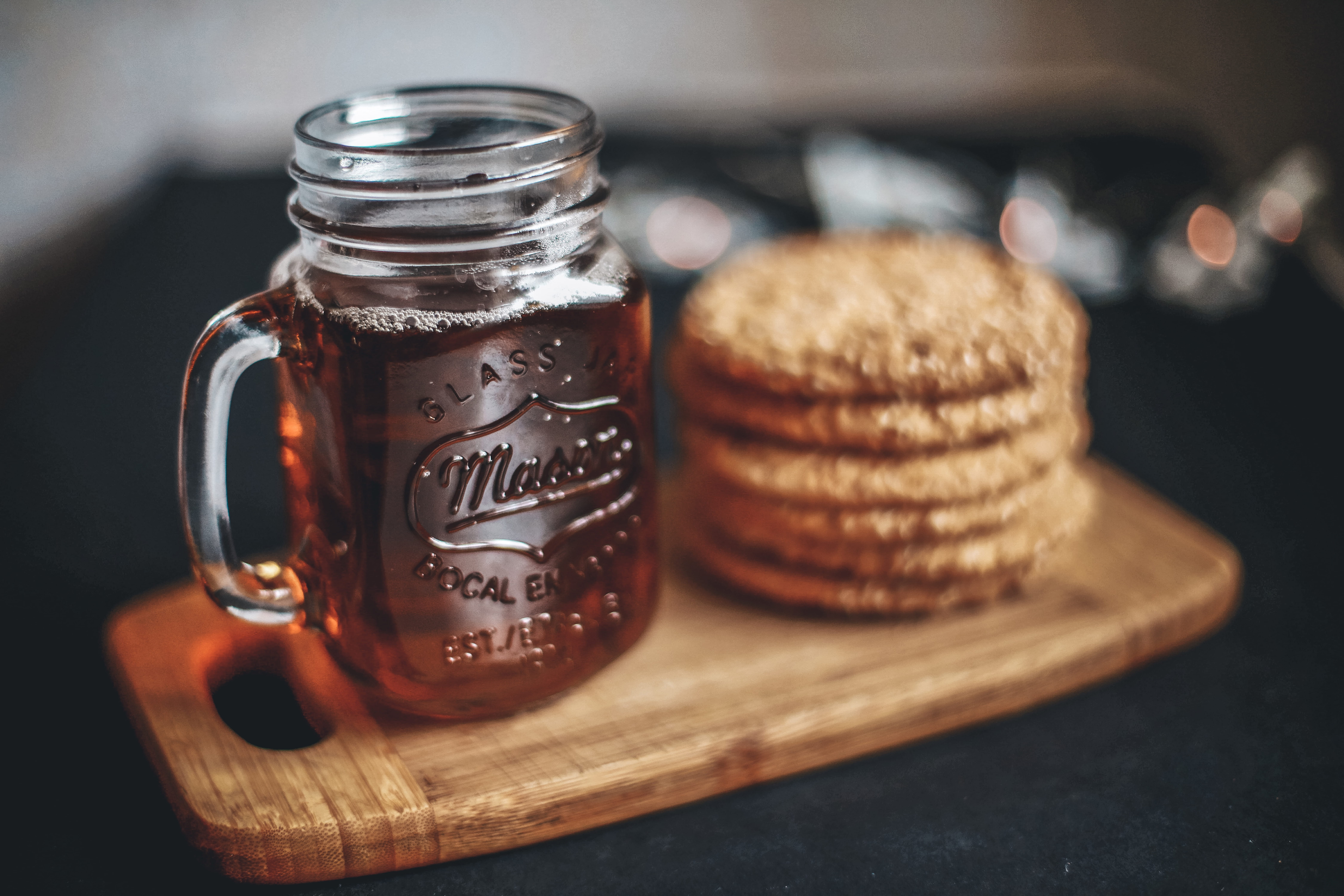 tea, cornbread, no people, table, group of objects, clear, brown, wood - material, sweets, selective focus, focus on foreground, text, jar, cookie, syrup, HD Wallpaper
