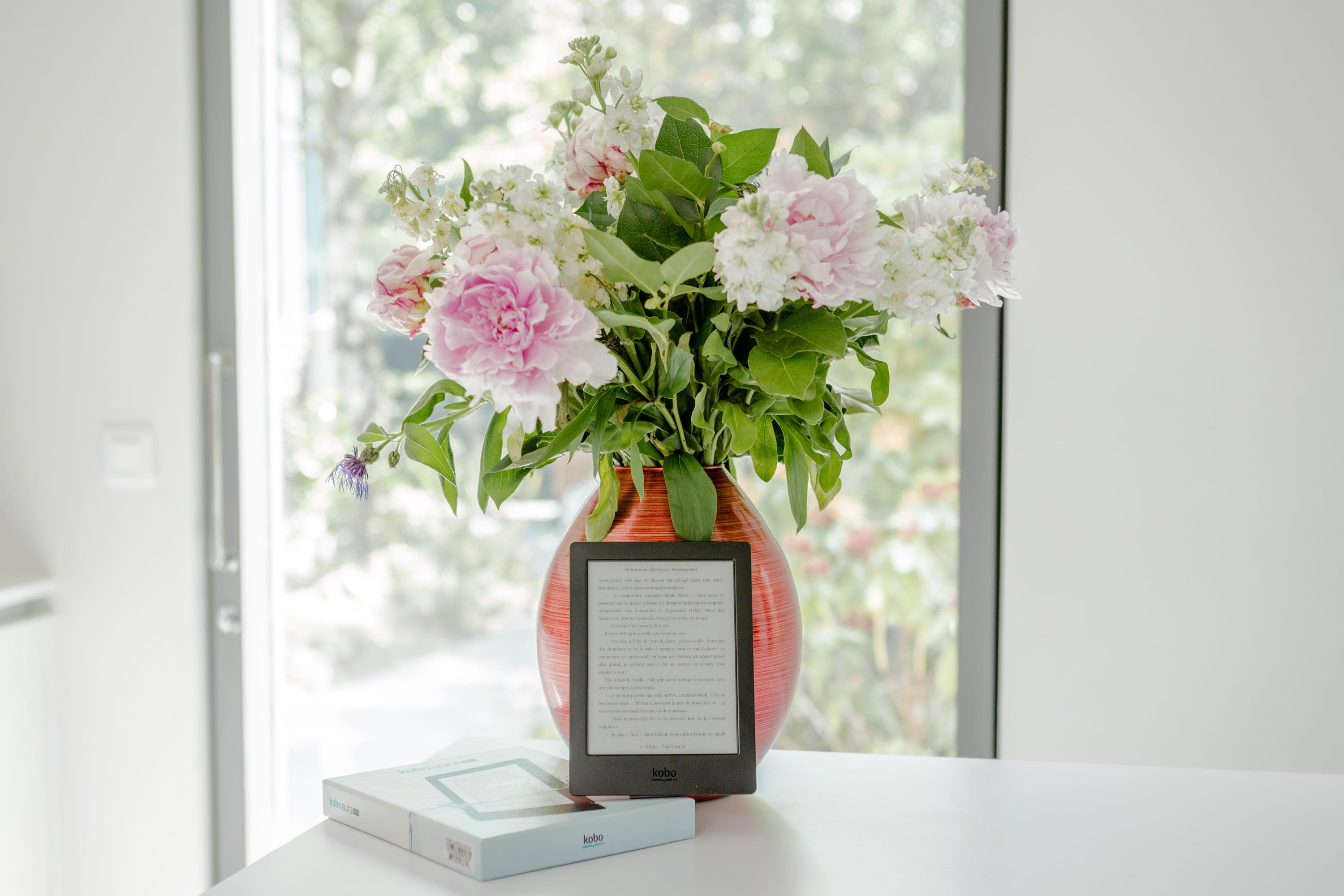 no people, kobo, bunch of flowers, indoors, plant, window, ebook, reader, flower head, arrangement, day, focus on foreground, flowering plant, 2K, vulnerability, HD Wallpaper