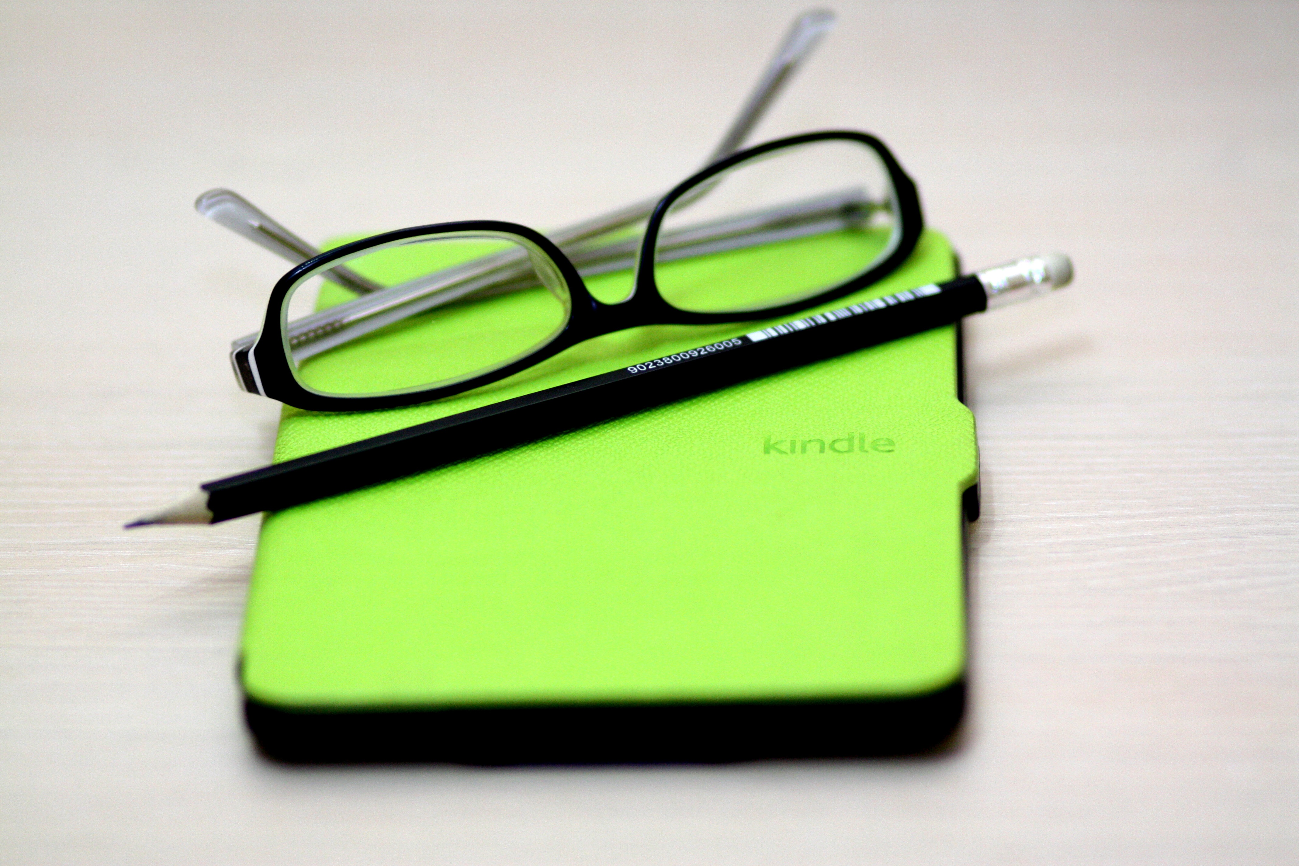 device, page, amazon, indoors, book, still life, office supply, digital, studio shot, e-reader, e-book, reading, 4K, glasses, paper, pen, technology, single object, HD Wallpaper