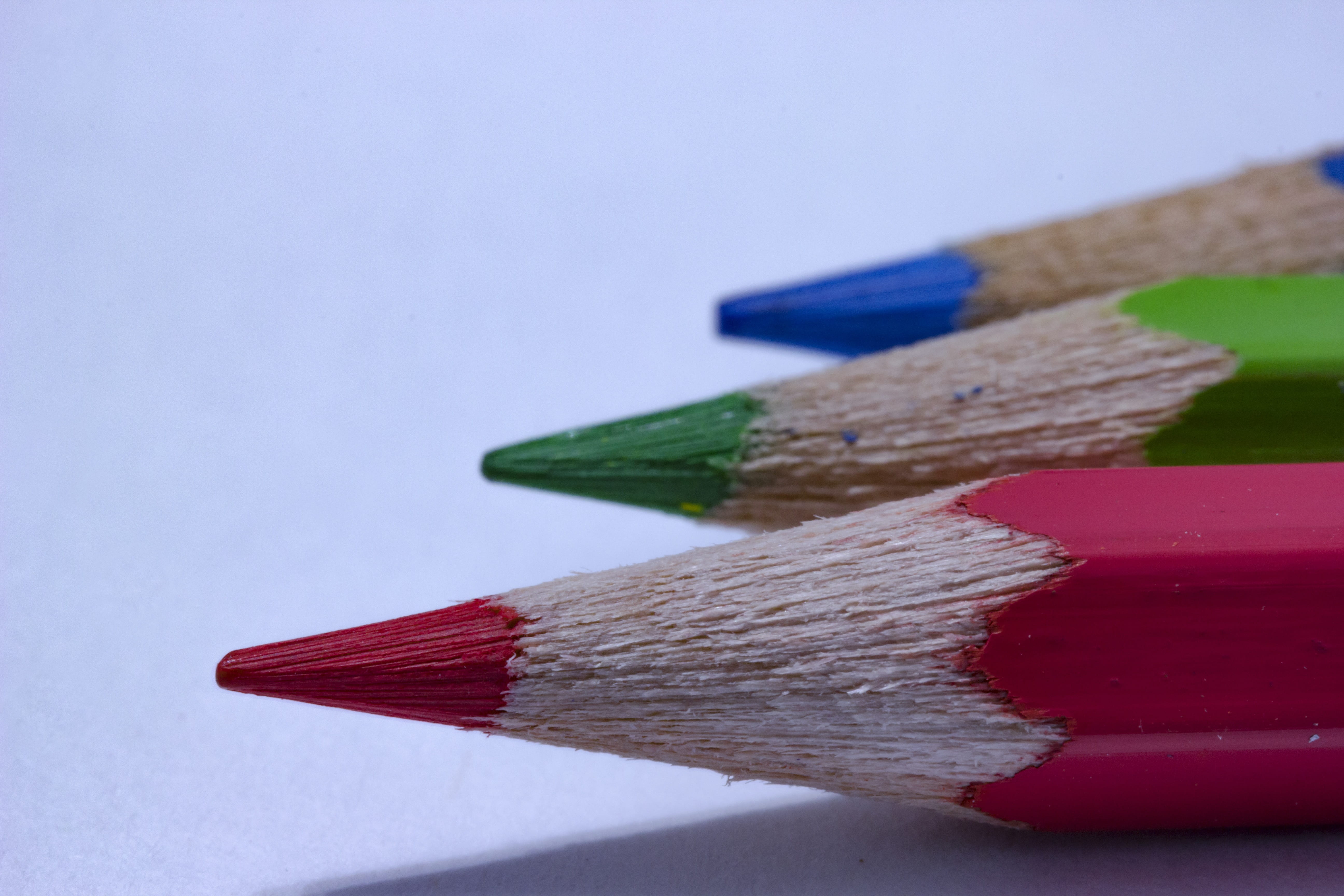 focus on foreground, variation, colored pencil, indoors, still life, green color, wood - material, red green blue, art and craft equipment, studio shot, HD Wallpaper