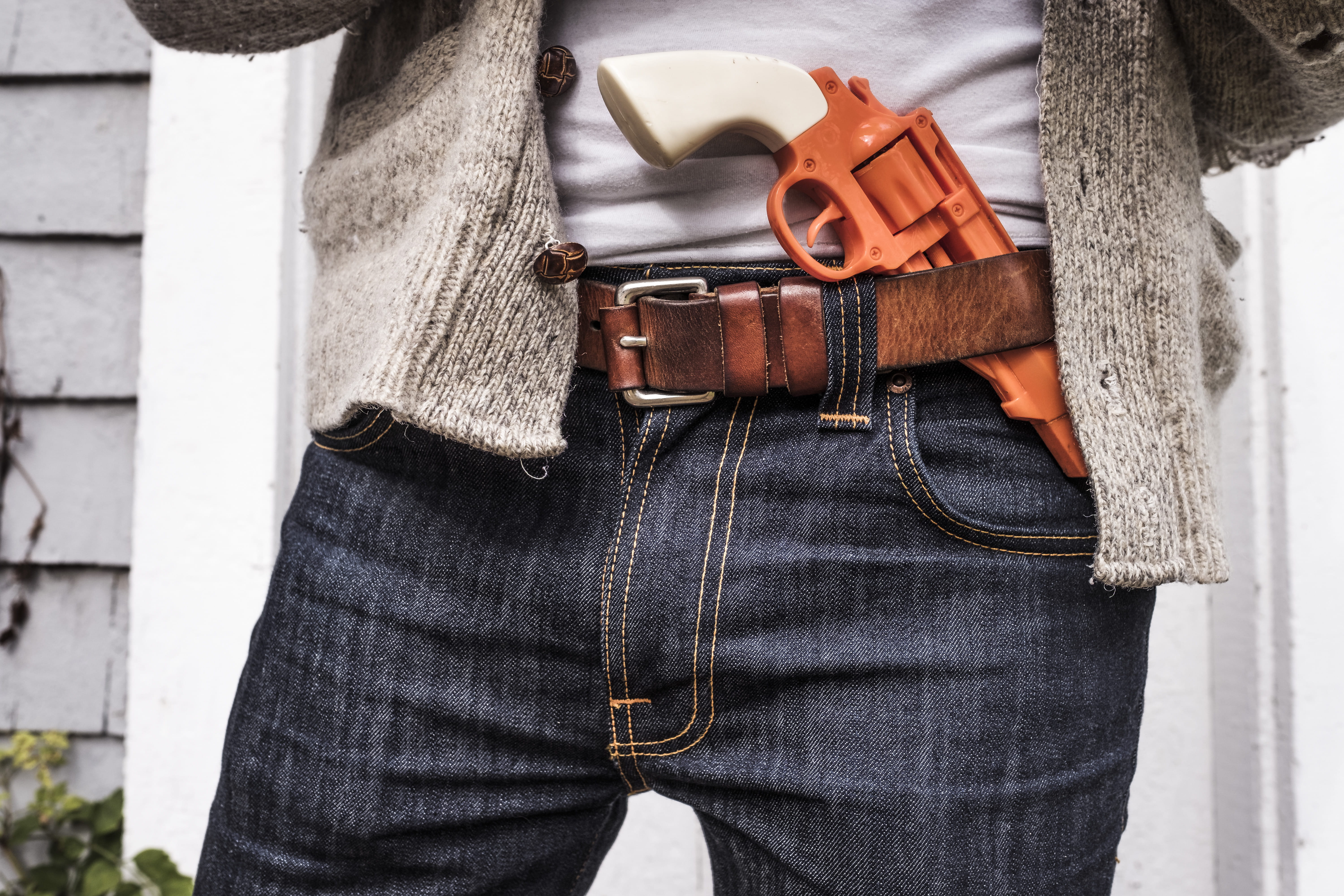 brown, holding, midsection, work Tool, outdoors, only men, caucasian Ethnicity, white, pocket, toy, front view, day, leisure activity, cowboy, lifestyles, HD Wallpaper
