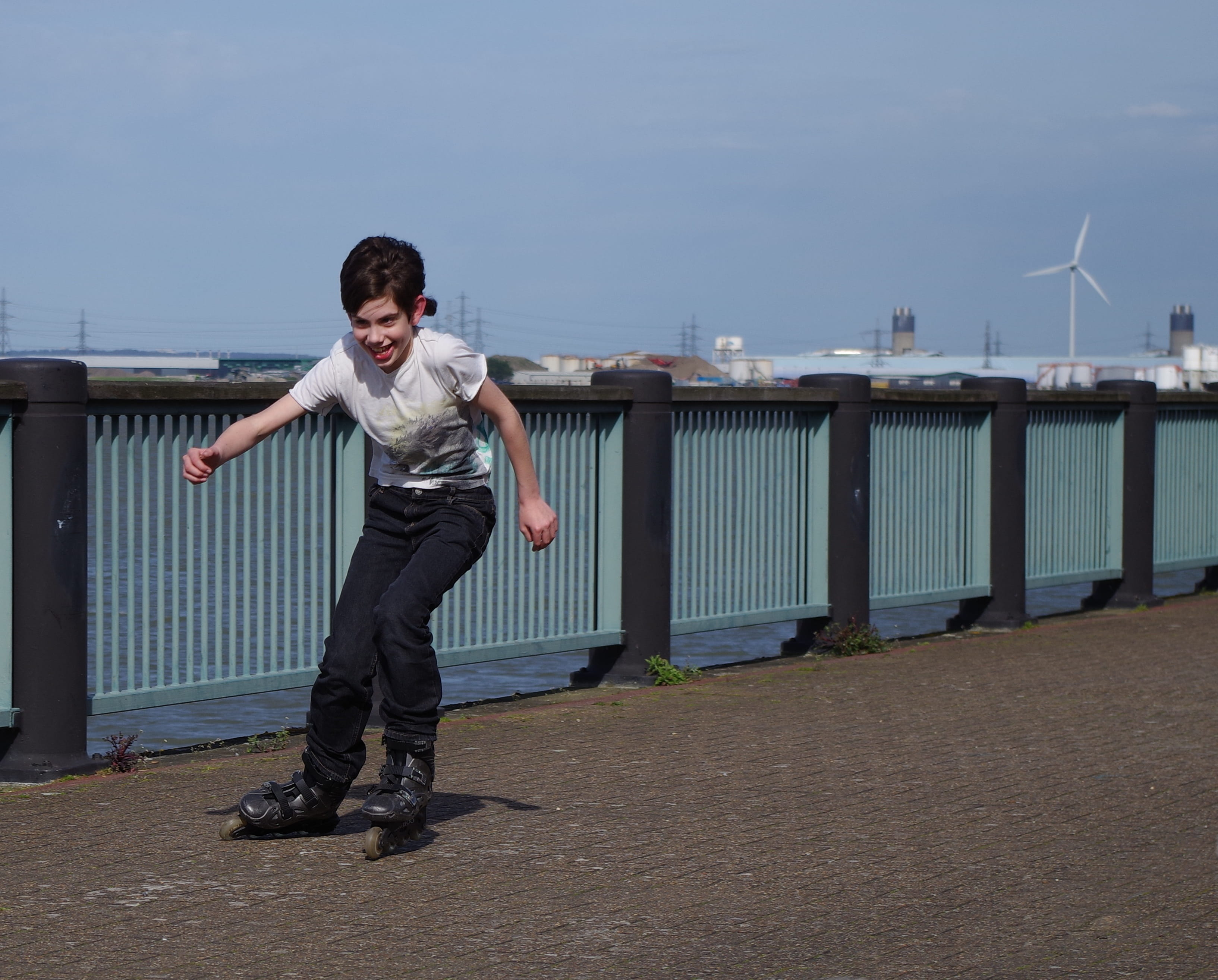 boy, human arm, standing, males, child, boys, exercise, fun, rollerblades, full length, lifestyles, one person, 2K, teen, front view, sky, joy, happy, HD Wallpaper