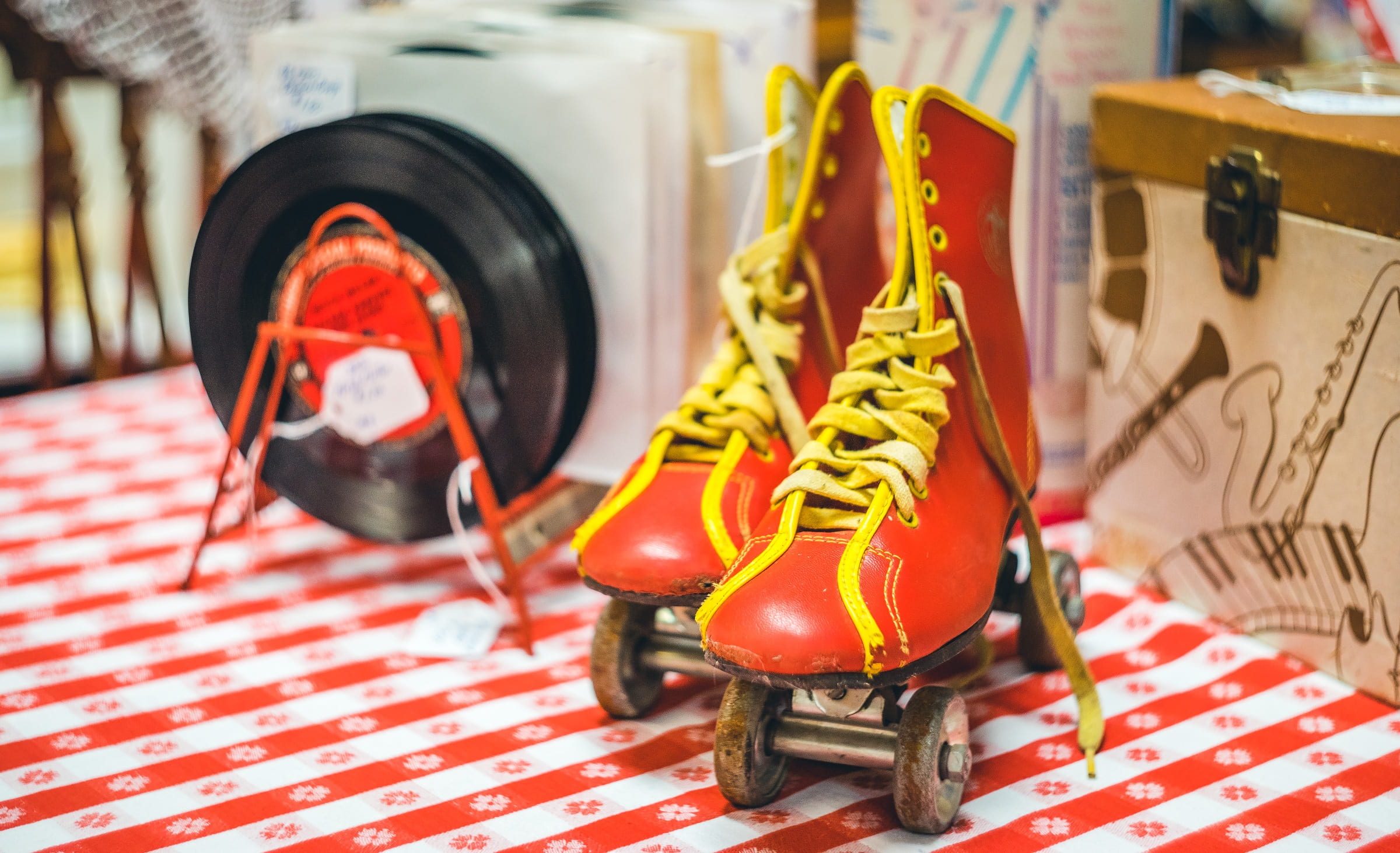 sixties, indoors, table, shoe, humor, day, lifestyle, skater, focus on foreground, roller skates, red, 1080P, sports shoe, close-up, fifties, vintage, HD Wallpaper