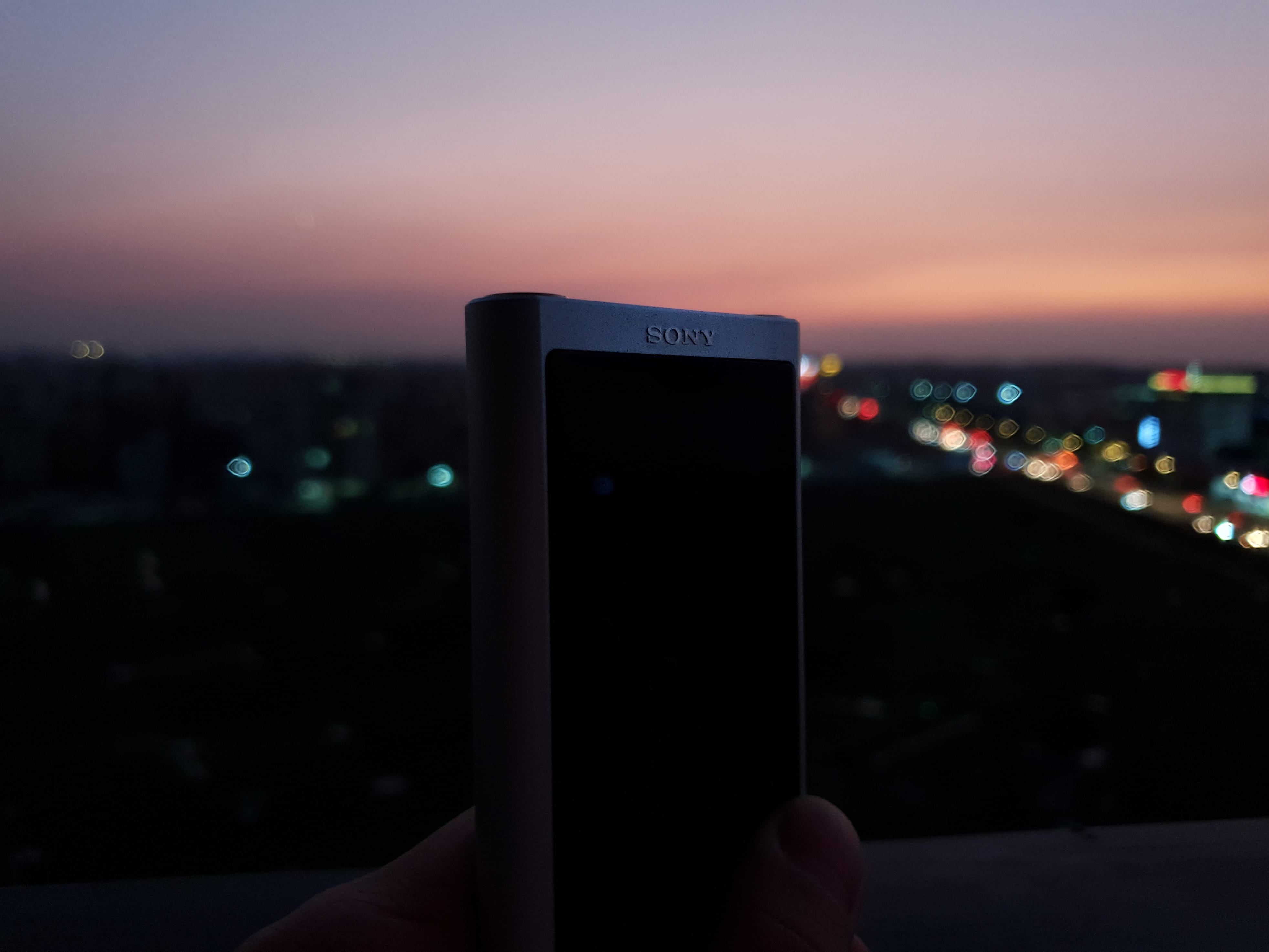 portable information device, iphone, human body part, outdoors, cell phone, sunset, dawn, red sky, human hand, night, city, guangzhou shi, hand, person, HD Wallpaper