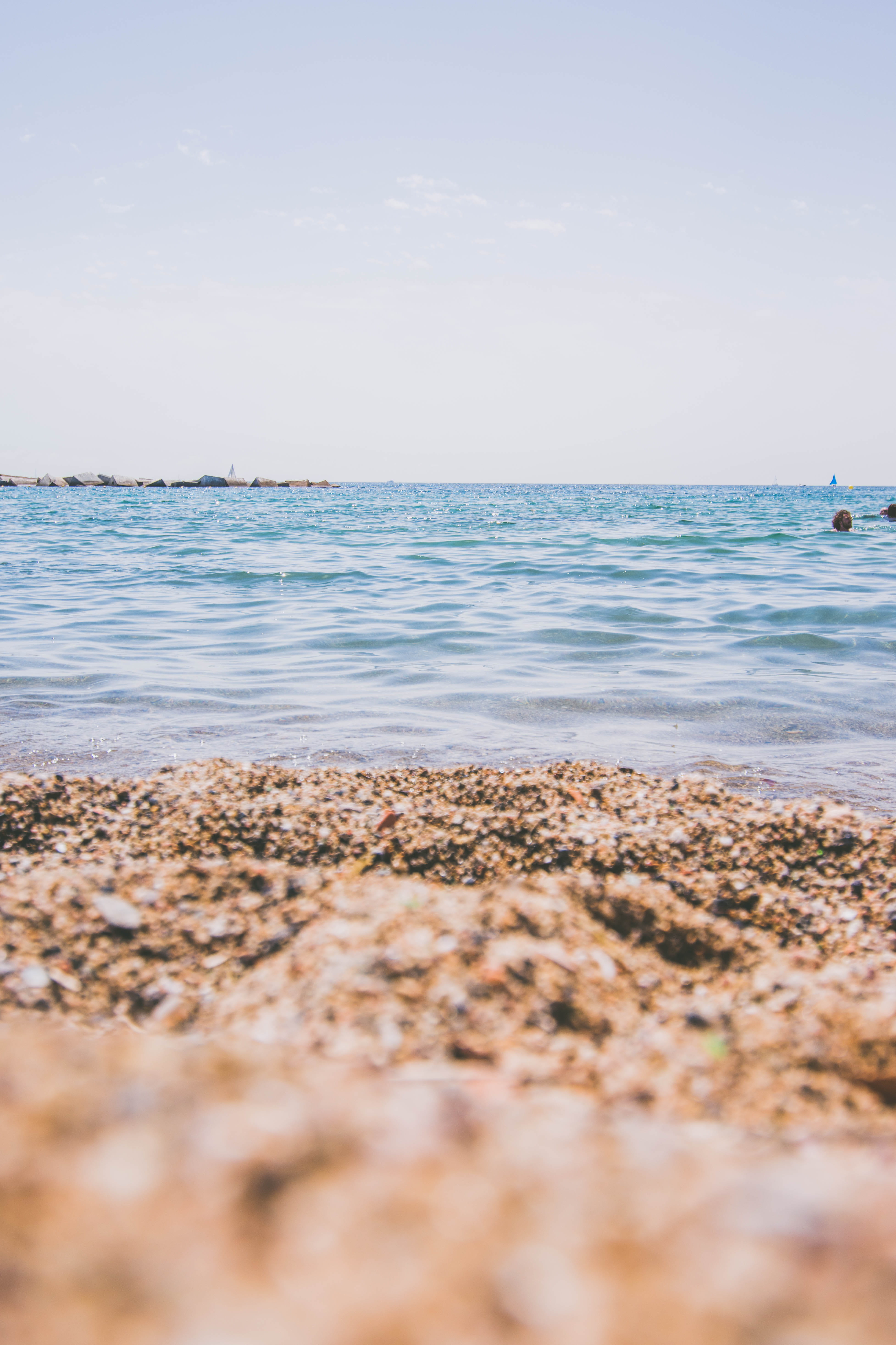 sky, 5K, water, coast, clear sky, sea, surface level, daytime, land, plant, beauty in nature, tranquil scene, ocean, people, beach, shore, copy space, Phone HD Wallpaper