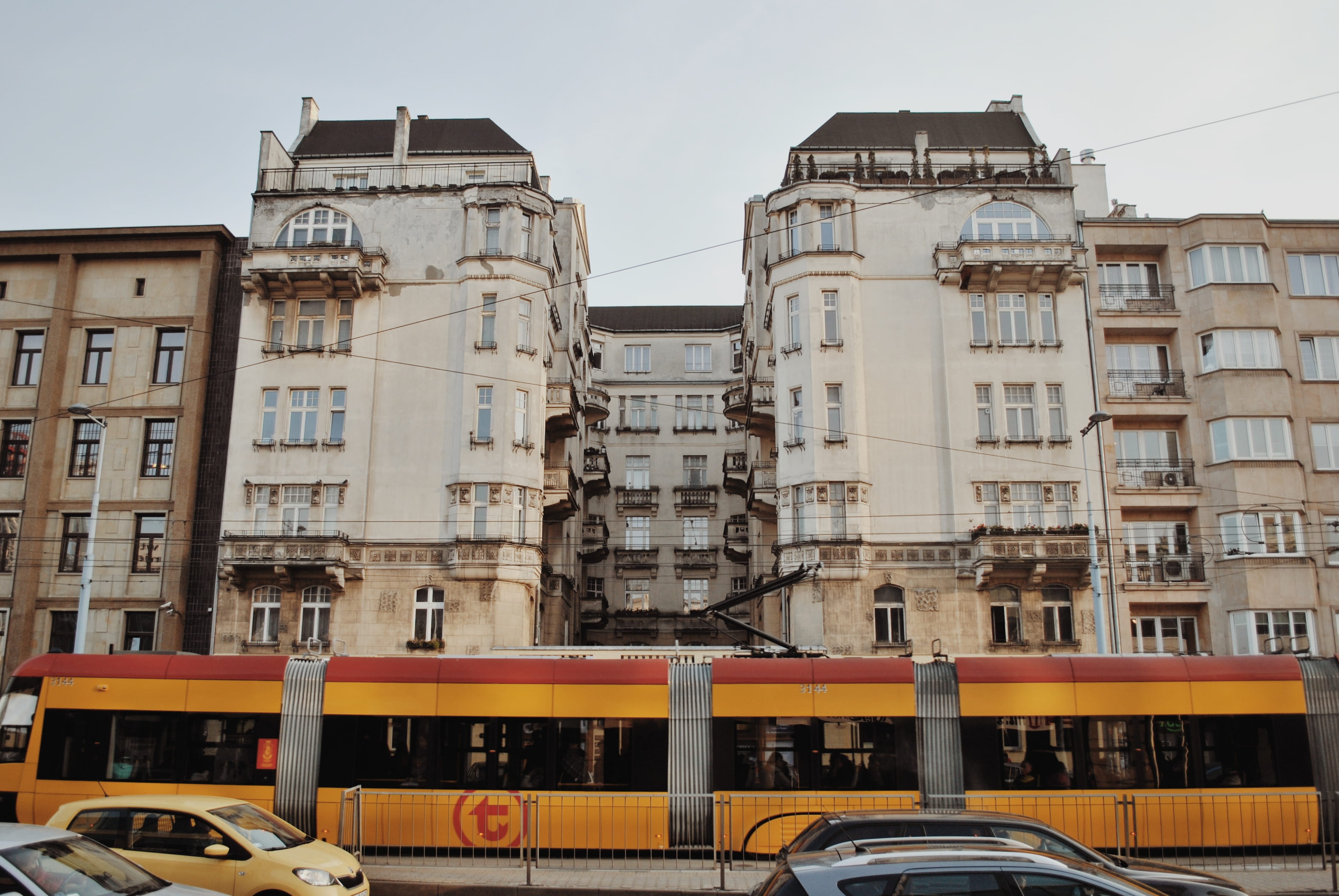 architecture, built structure, car, train, mode of transportation, apartment, street, transportation, high, motor vehicle, tram, warszawa, automobile, warsaw, HD Wallpaper