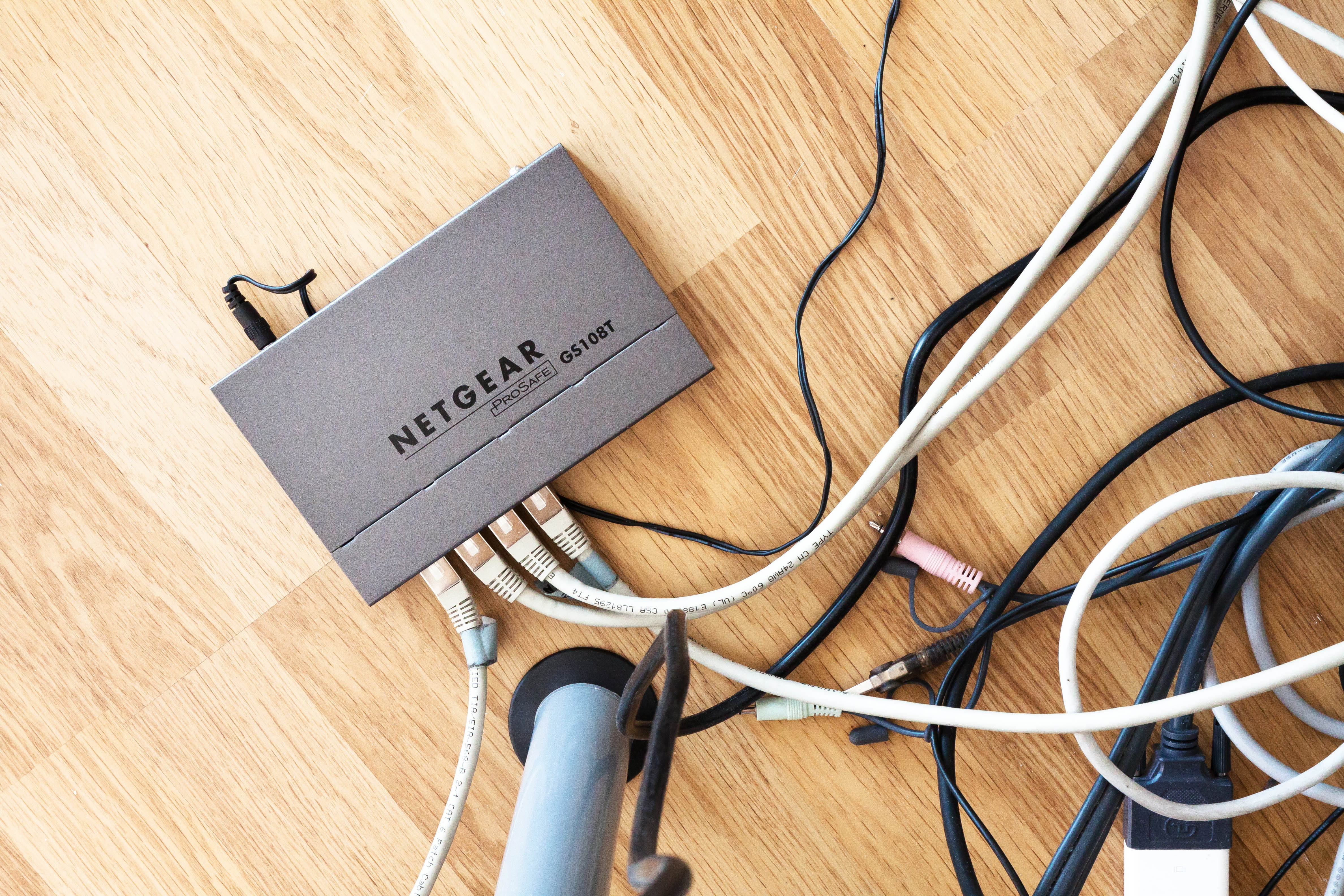 still life, communication, high angle view, modem, network connection, electricity, netgear, flooring, parquet, text, wireless, office, table, hardwood floor, HD Wallpaper