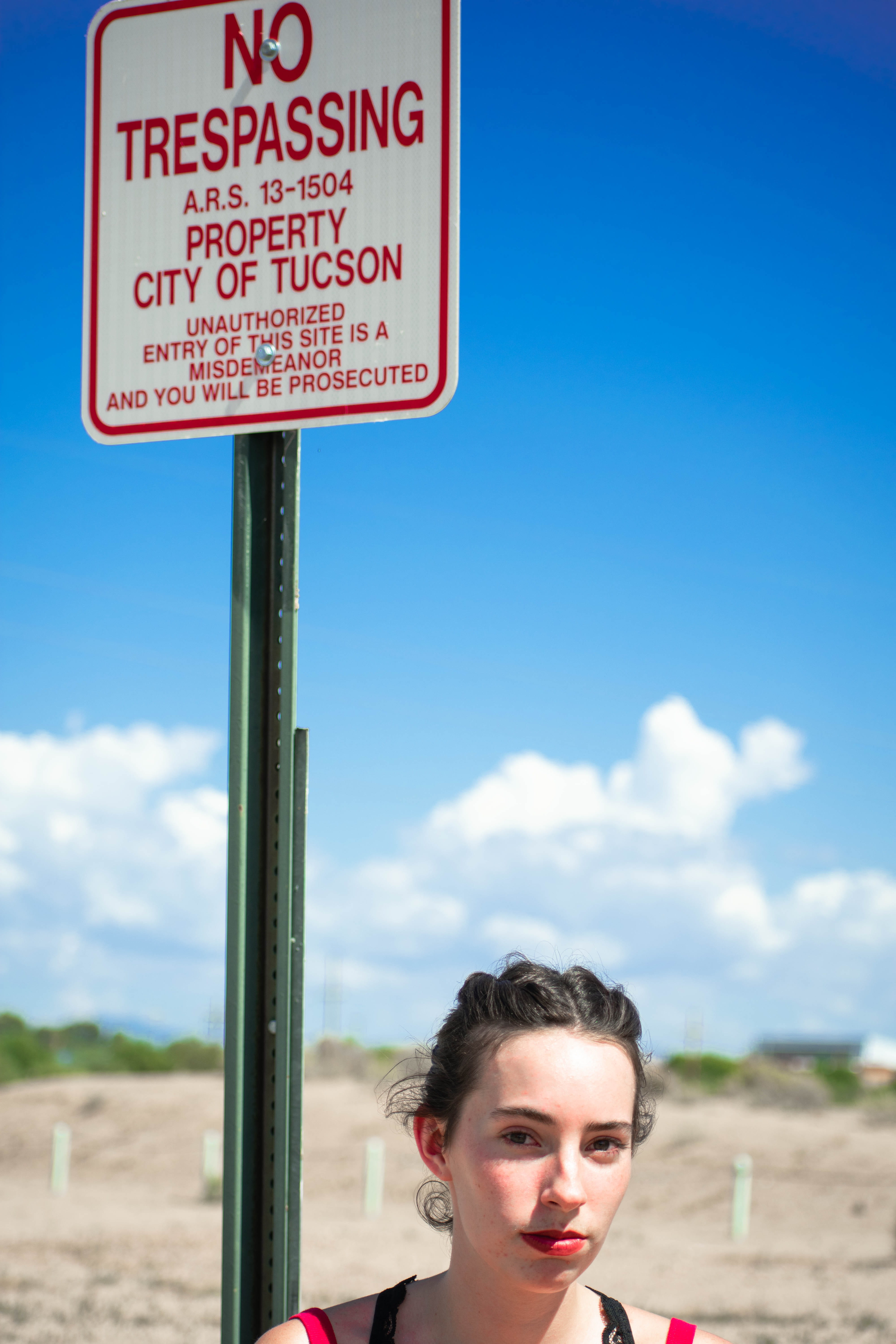 sunny, striking, no trespassing, sky, clouds, afternoon, desert, cloud - sky, headshot, outdoors, land, one person, green, lady, lifestyles, blue sky, girl, Phone HD Wallpaper