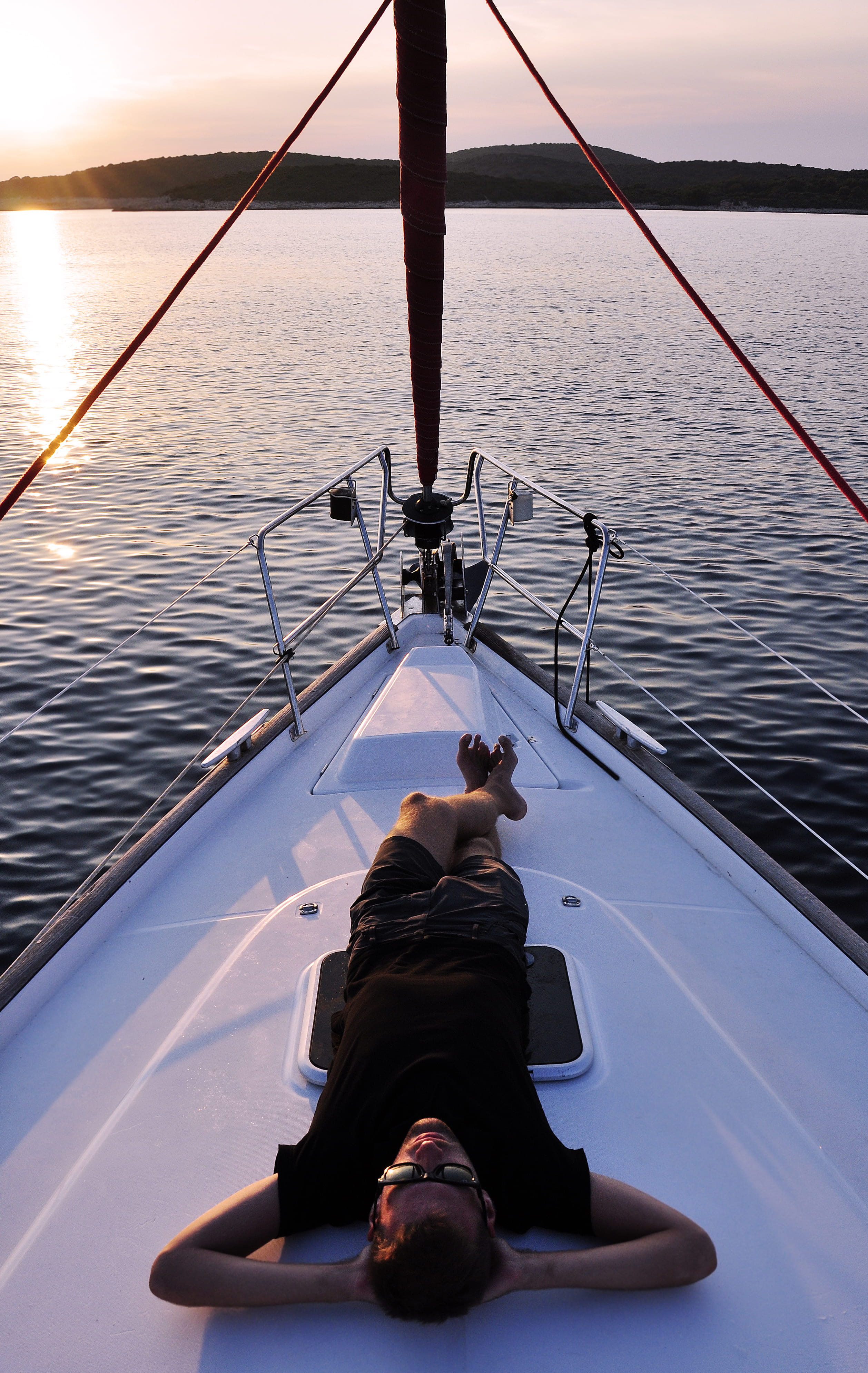 laying, sailing, real people, lying down, lifestyles, 4K, one Person, summer, sea, water, sailing Ship, yacht, boat, sky, full length, outdoors, sailboat, Phone HD Wallpaper
