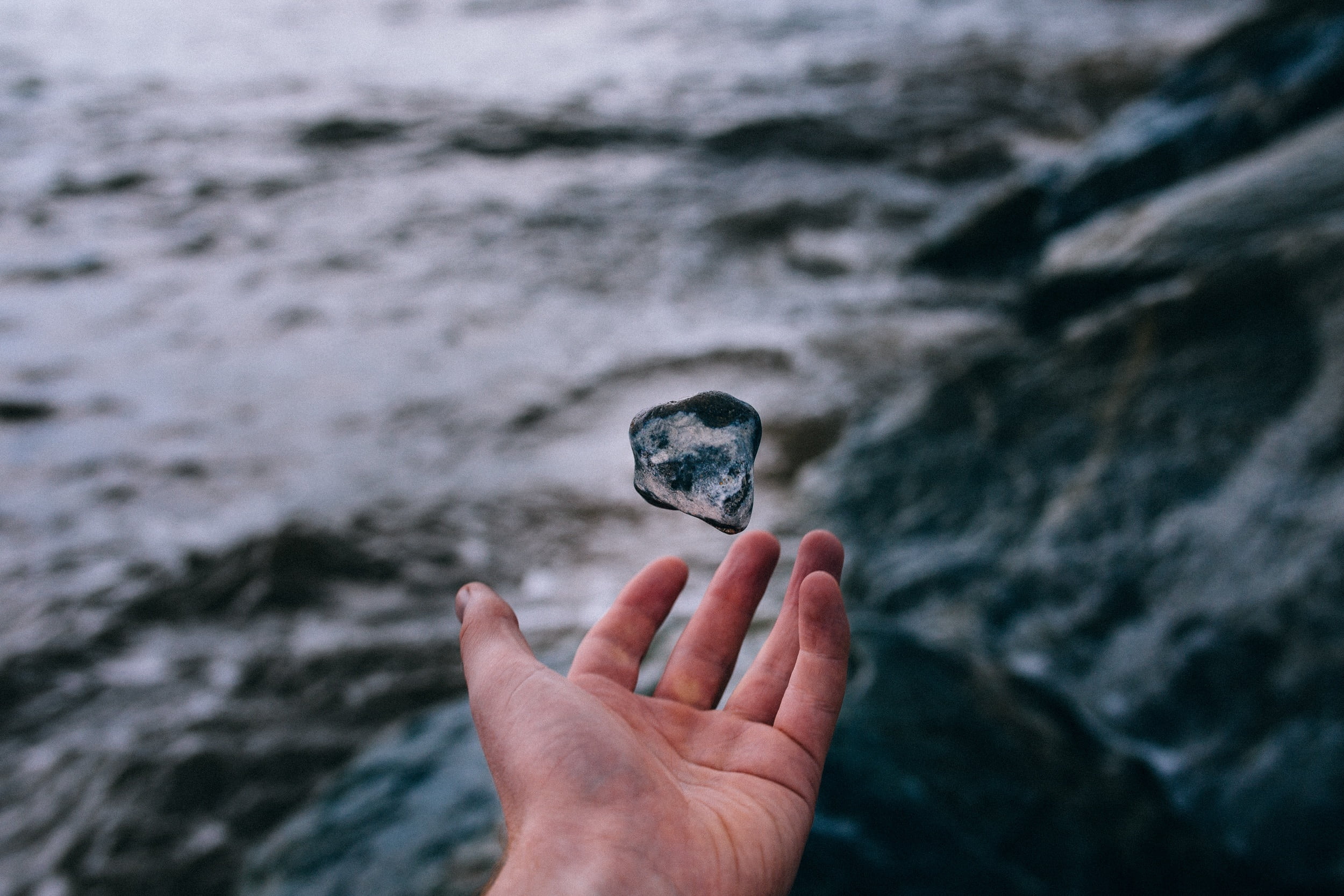 human hand, ripples, human finger, sea, bokeh, hold, nature, ocean, people, day, rock, finger, human body part, water, close-up, male, person, holding, HD Wallpaper