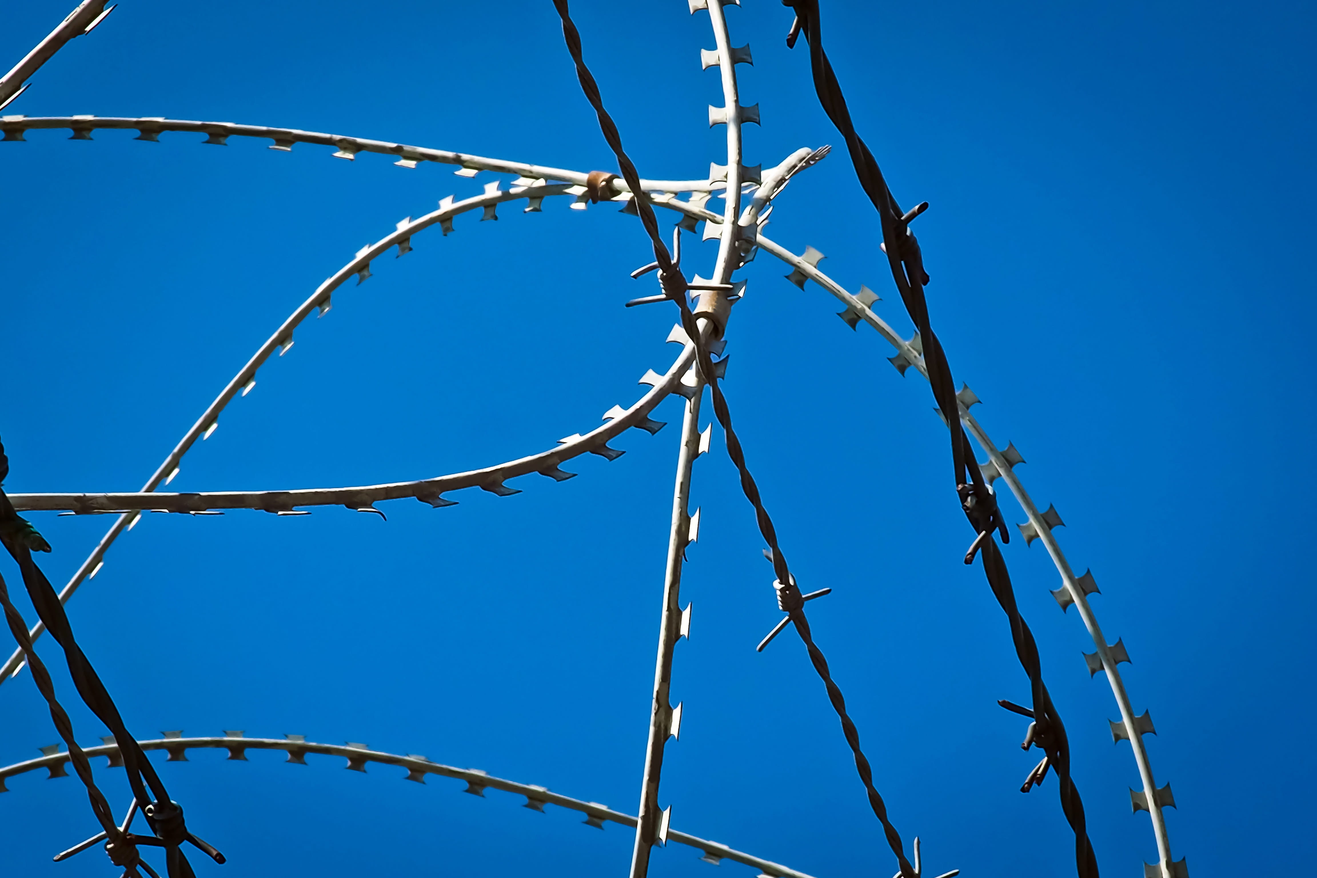 Sky, power supply, boundary, Wire, Metal, fenced, sunlight, dom, imprisoned, security, barrier, protection, day, barbed wire fence, limit, metal, low angle view, HD Wallpaper