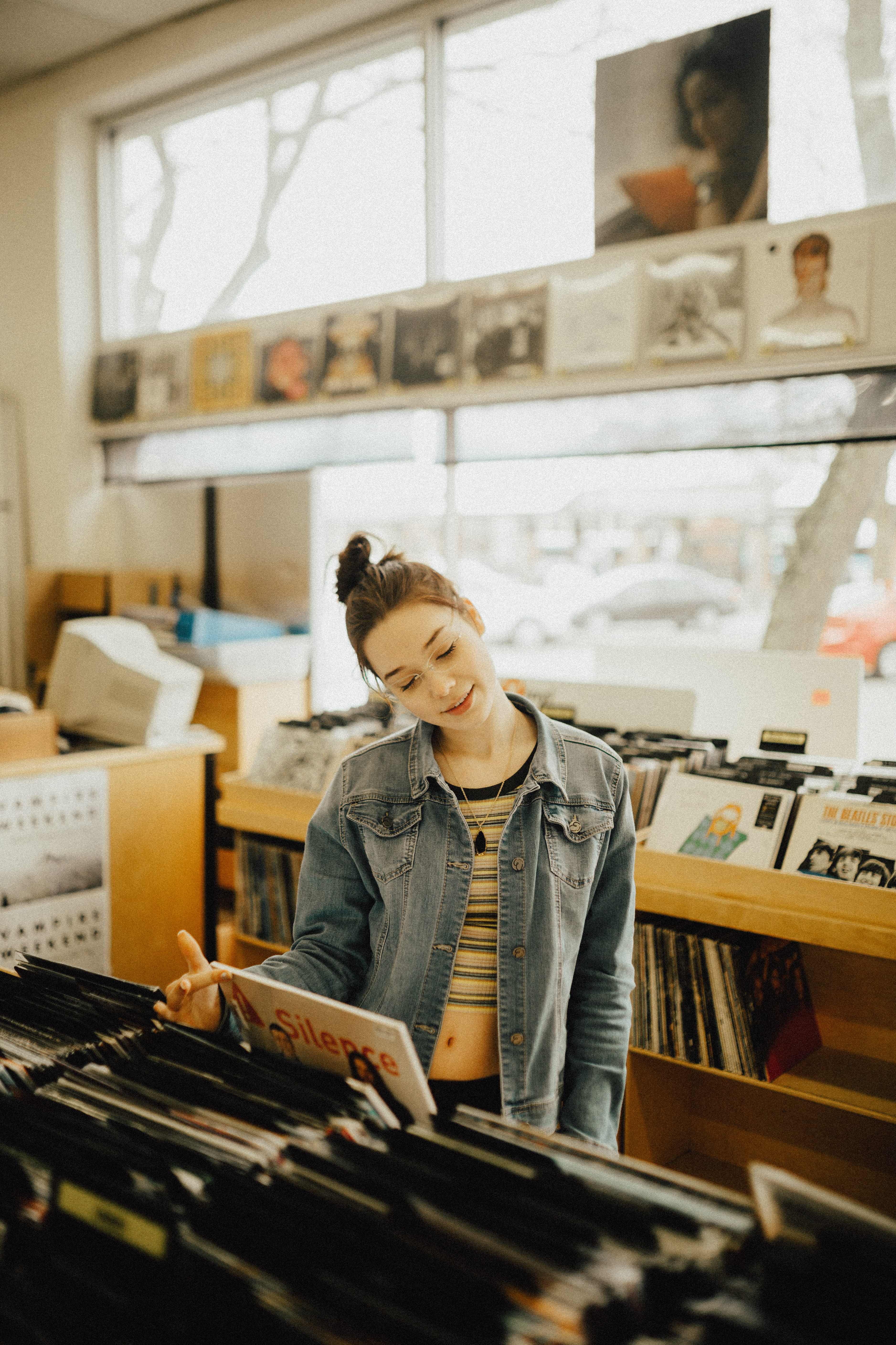 one person, waist up, selective focus, business, denim, shop, store, musical instrument, record, women, young women, blue, working, woman, adult, 5K, lifestyles, Phone HD Wallpaper