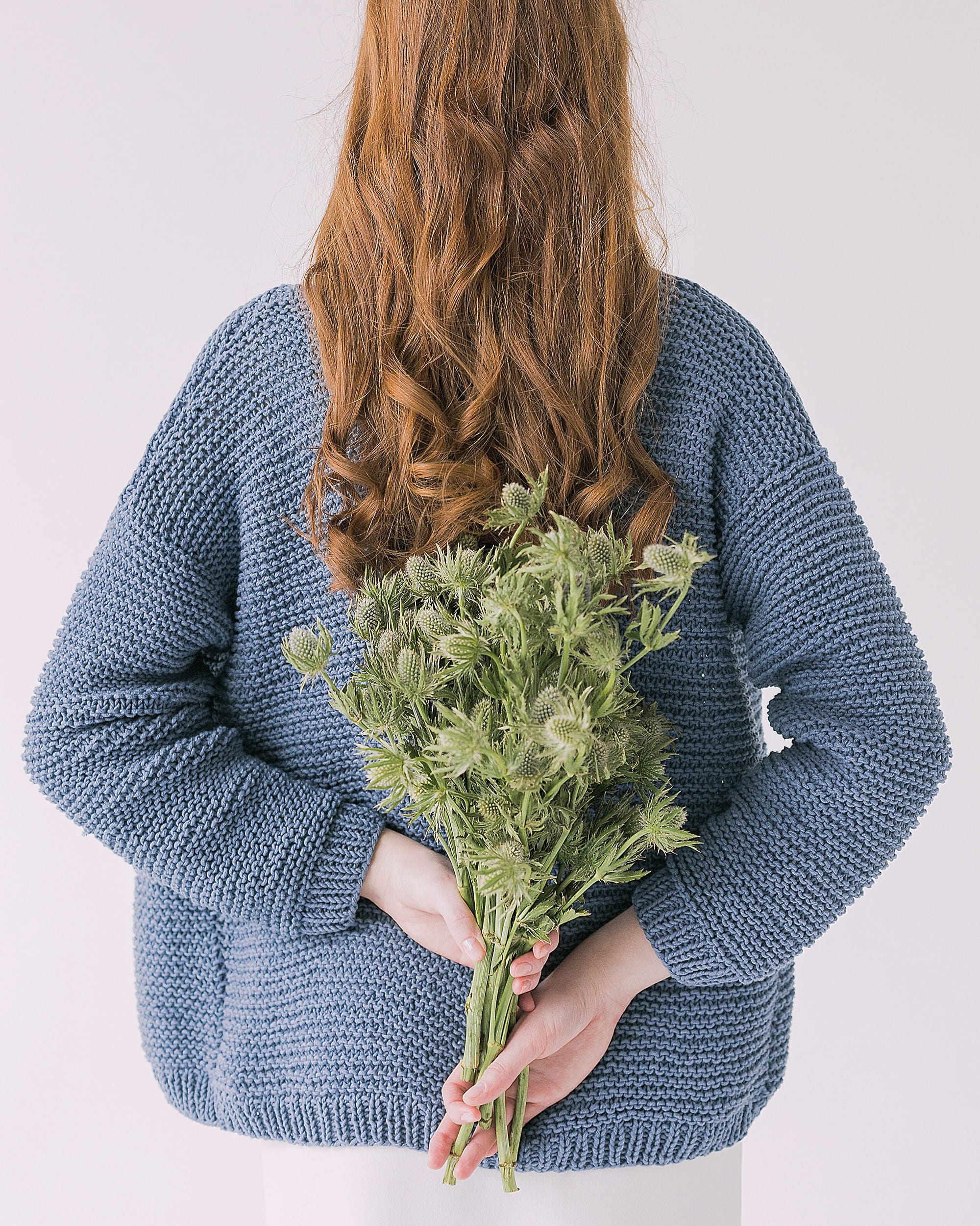 front view, hair, long hair, sweater, plants, woman, plant, adult, gray, flower, green, indoors, style, wear, human hair, hands, one person, standing, cut out, Phone HD Wallpaper