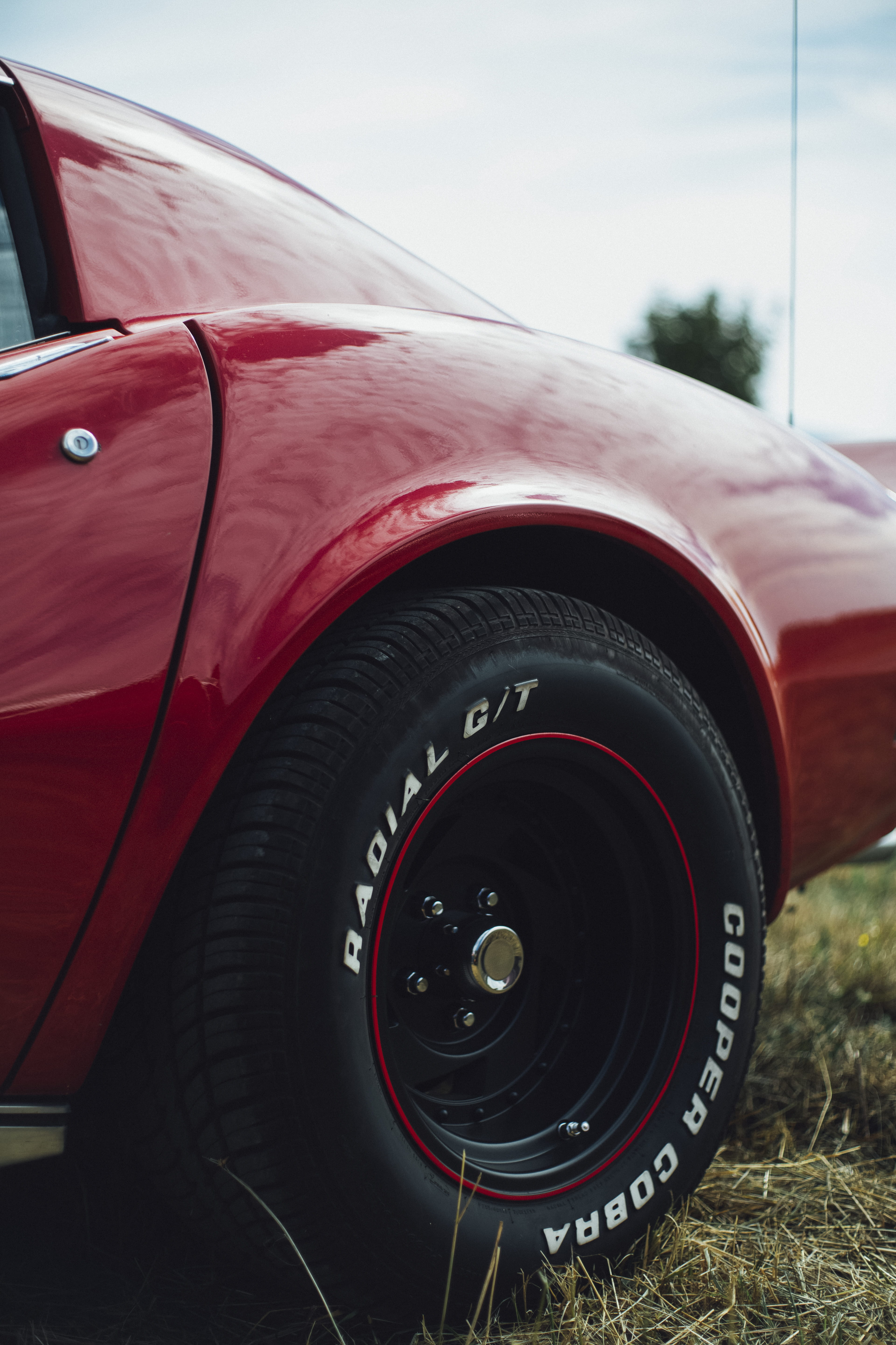 glass - material, car wheel, red, bumper, luxury, engine, mode of transportation, wheel, close-up, vehicle, convertible, machine, motor vehicle, automobile, Phone HD Wallpaper