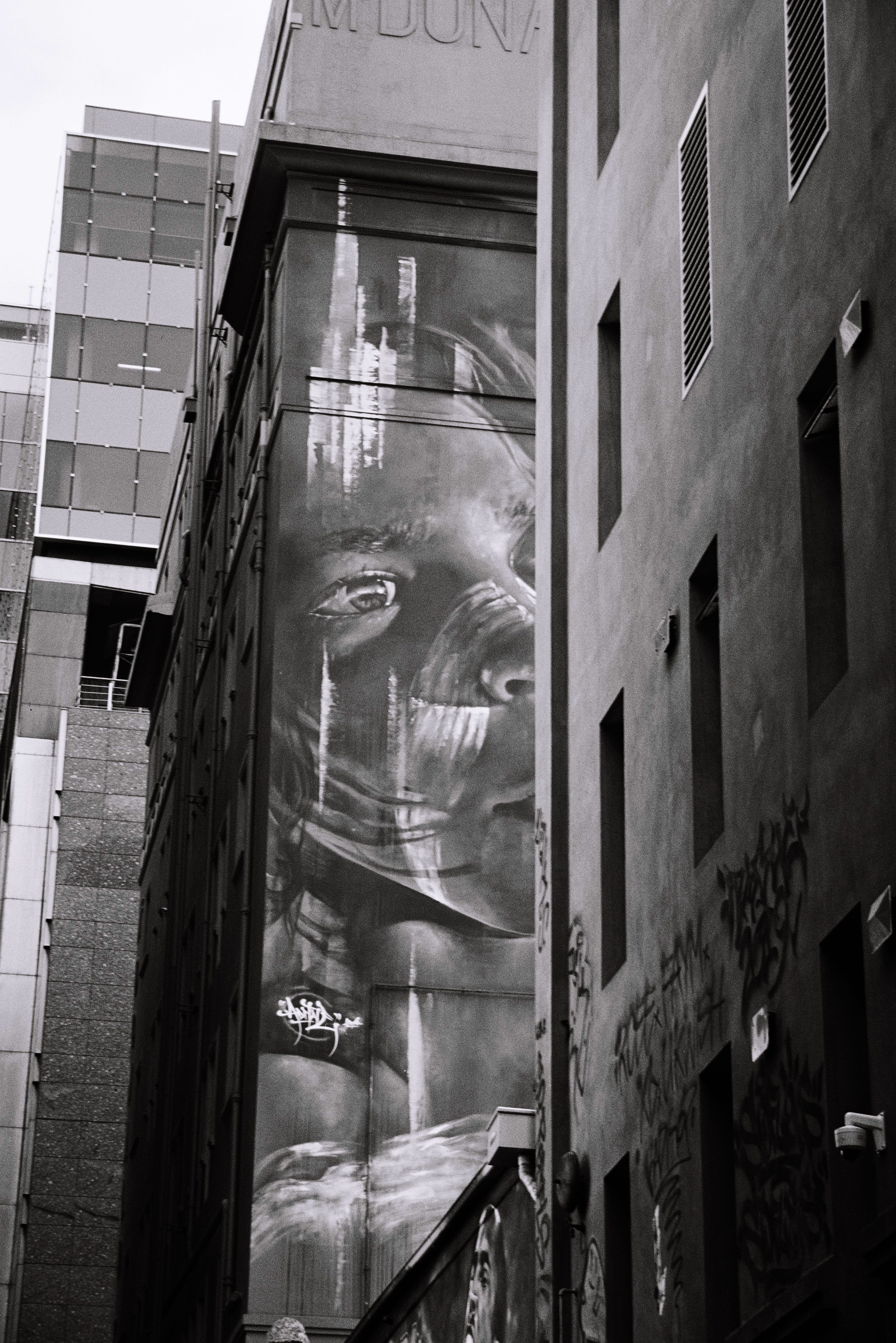 buildings, street, wall, 5K, town, street art, photography, concrete, black and white, built structure, exterior, communication, day, wall - building feature, Phone HD Wallpaper