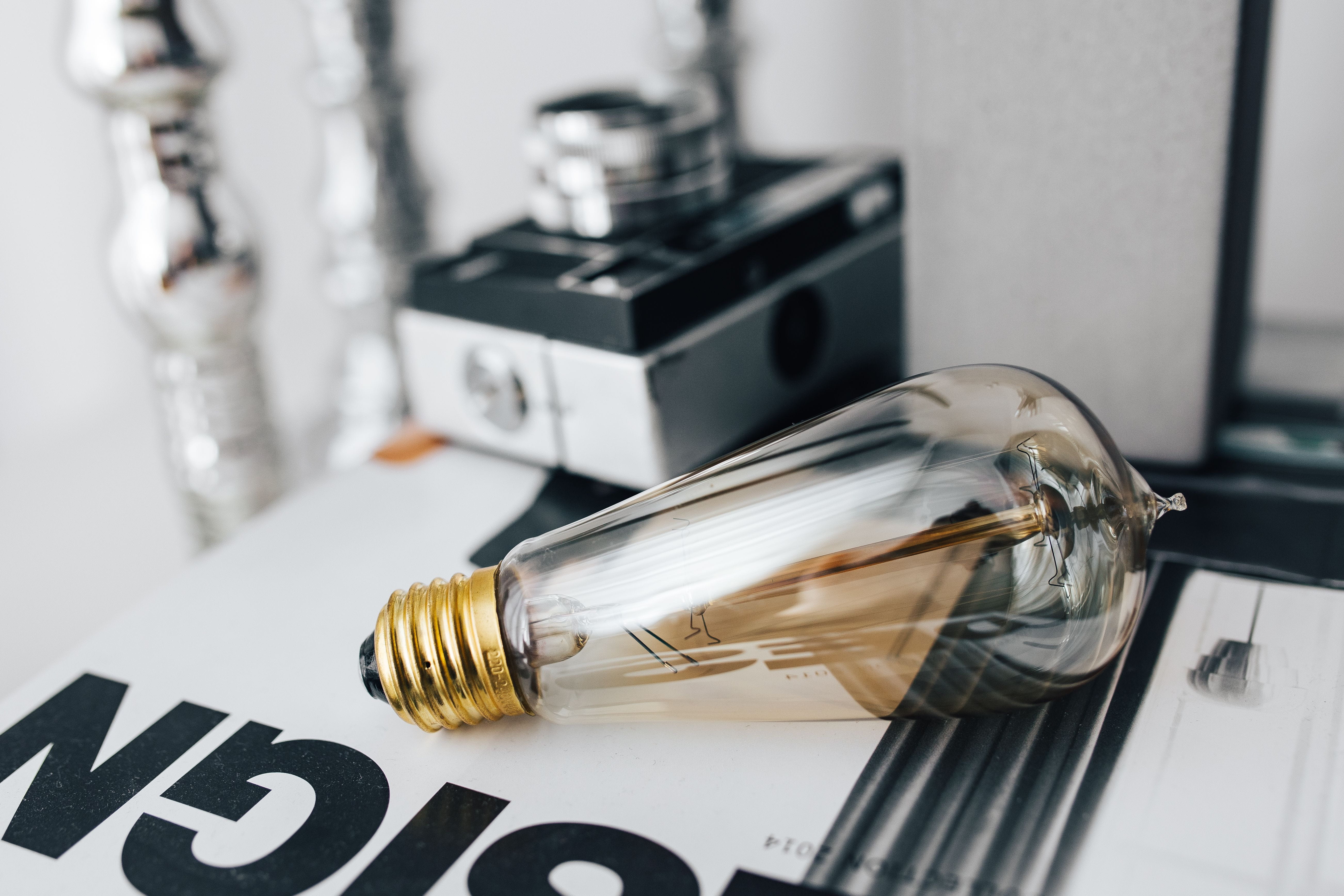equipment, lightbulbs, blackandwhite, old, technology, creativity, vintage, magazines, office, close-up, lightbulb, table, text, indoors, industry, fork, HD Wallpaper