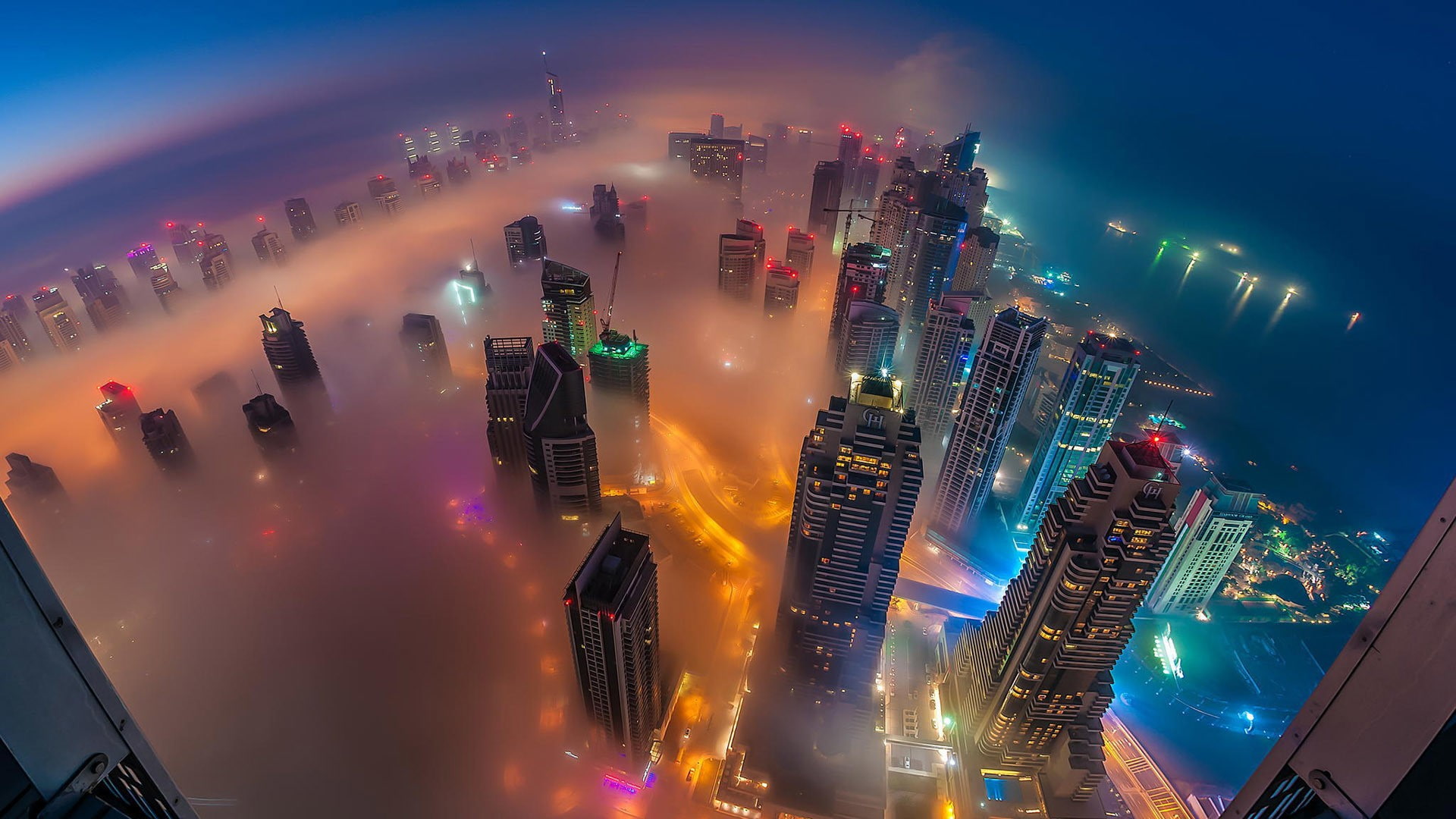 architecture  lights  cranes (machine)  Dubai  night  United Arab Emirates  sea  cityscape  bay  street  mist  skyscraper  mountains  birds eye view  building  city, HD Wallpaper