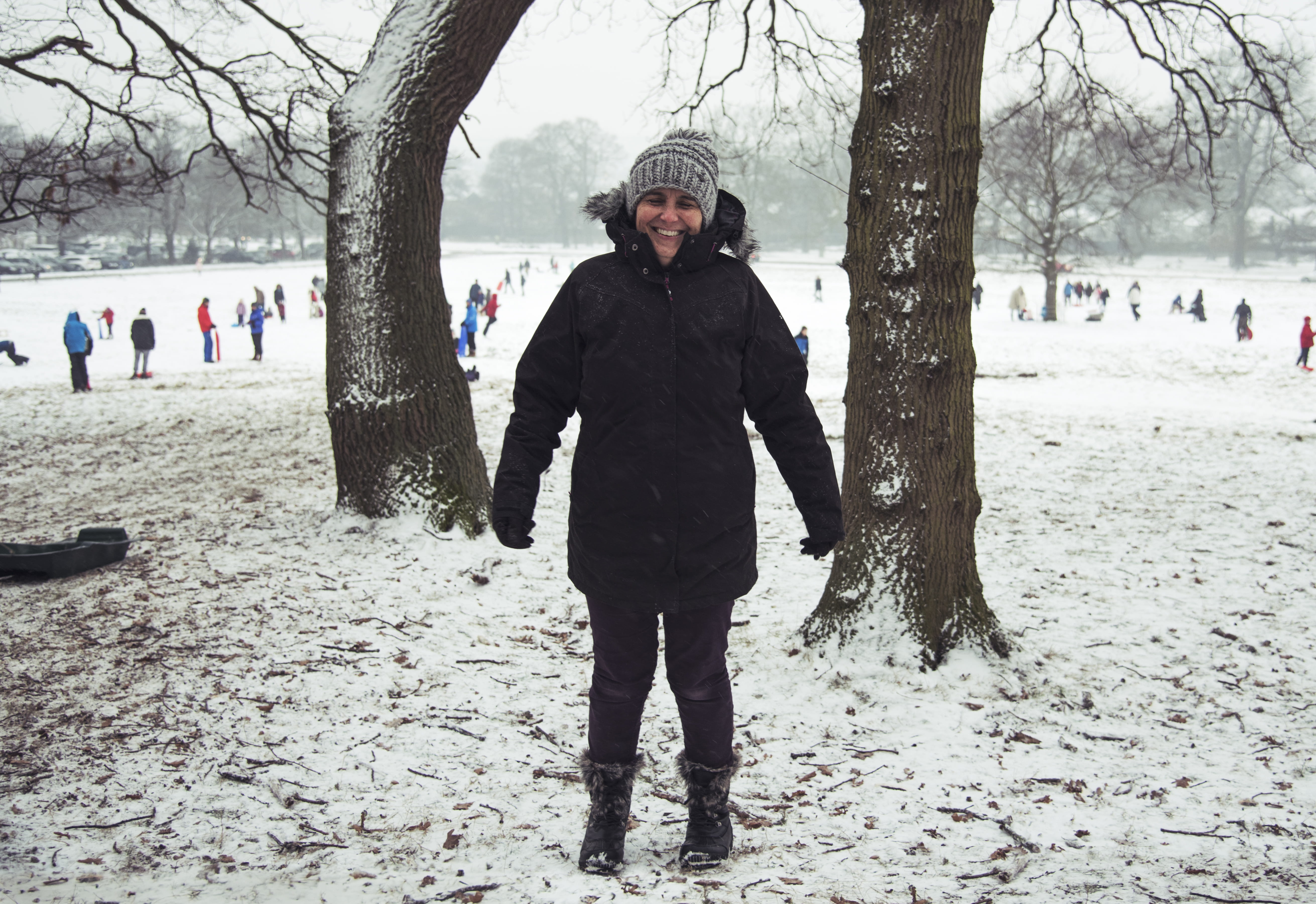 warm clothing, day, clothing, united kingdom, one person, real people, hat, sledging, standing, snow, nature, trunk, outdoors, front view, coat, cold temperature, HD Wallpaper