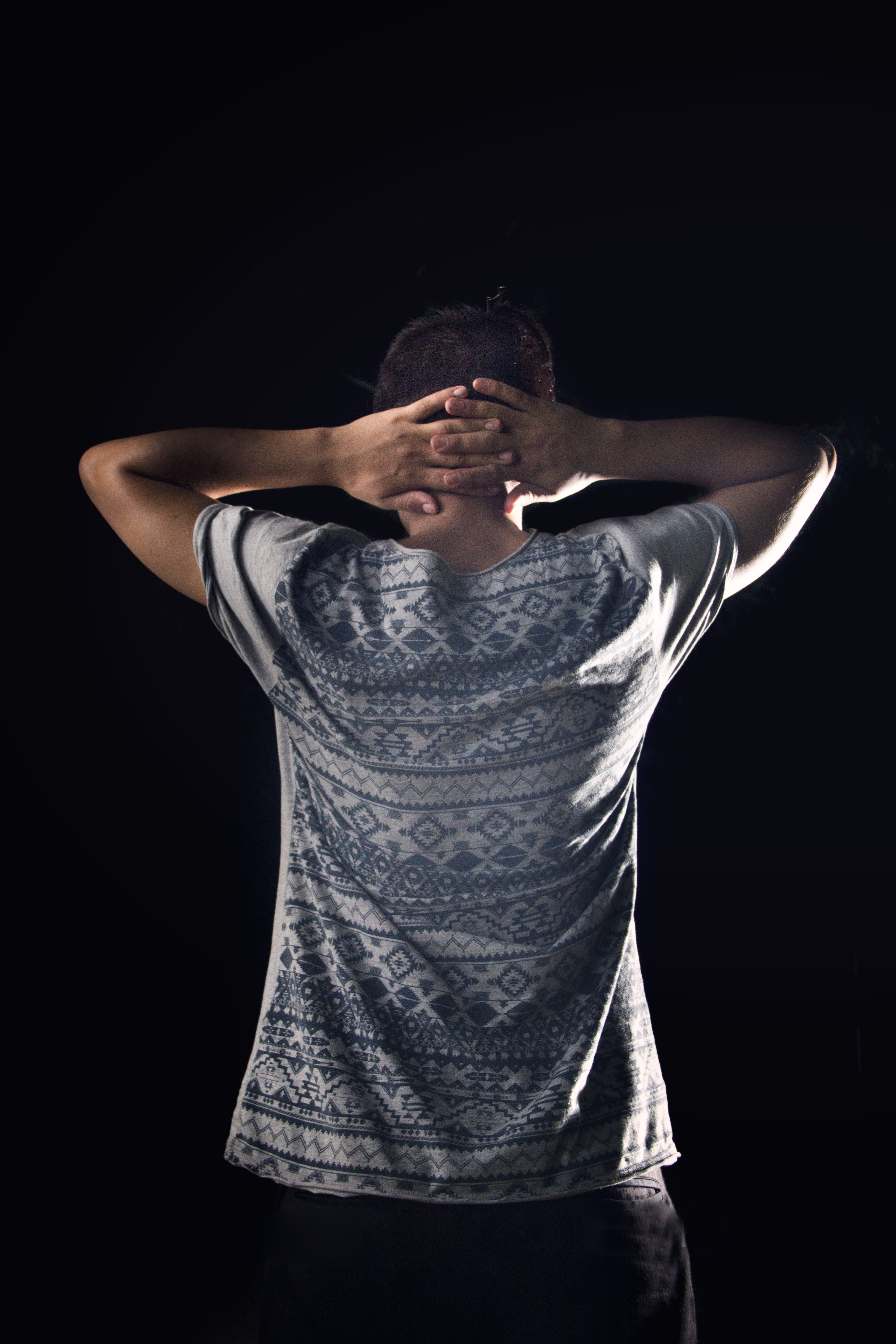 arms raised, young adult, indoors, human limb, one person, emotion, man, three quarter length, studio shot, casual clothing, 5K, backwards, adult, light, Phone HD Wallpaper