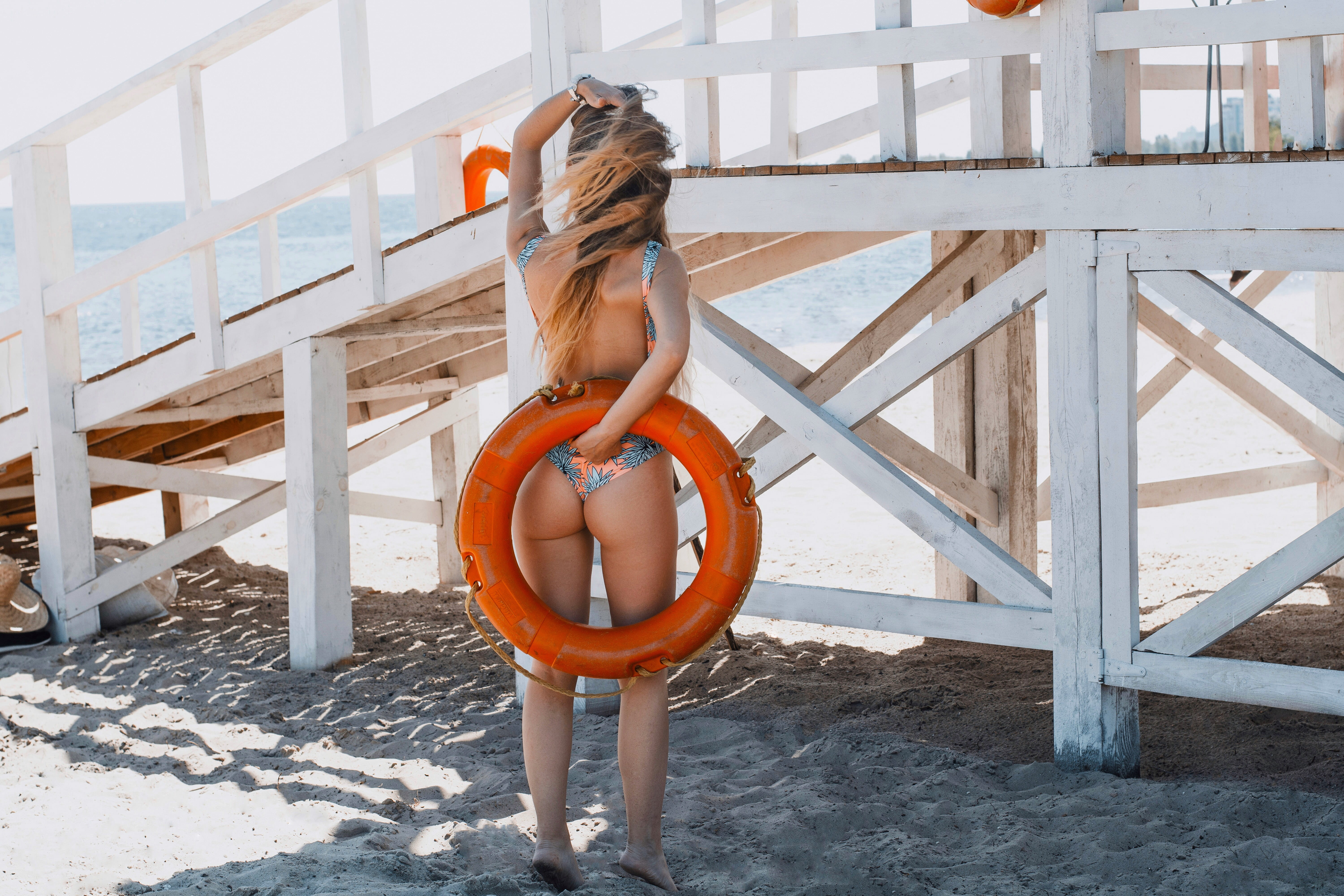 face, backward, architecture, lifeguard tower, 5K, full length, life, hairstyle, real people, clothing, nature, women, sitting, staircase, rescue, life preserver, HD Wallpaper