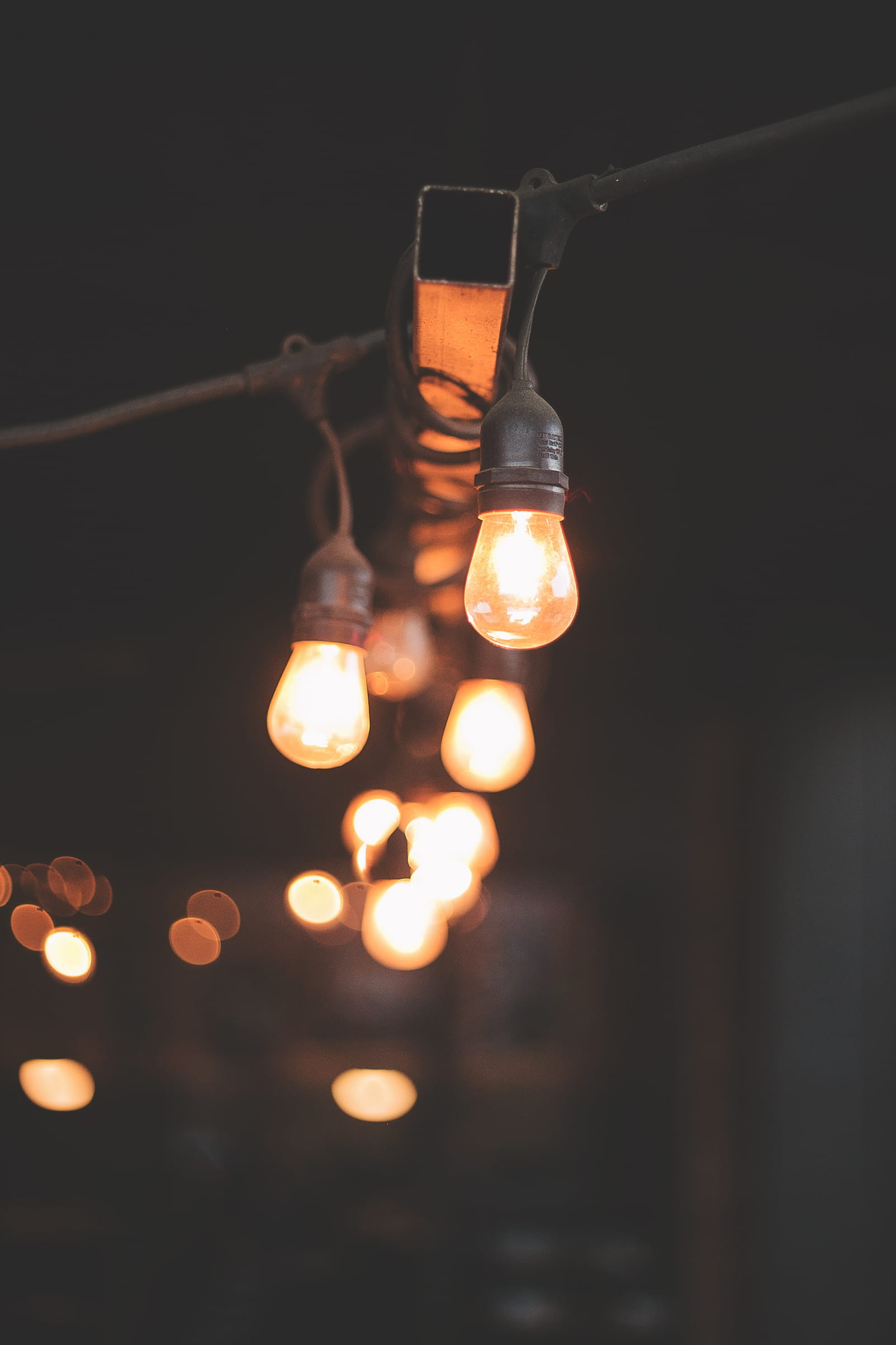 hanging, lighting equipment, close-up, electric light, united states, light bulb, warm, bokeh, light, night, filament bulb, electricity, glass - material, Phone HD Wallpaper