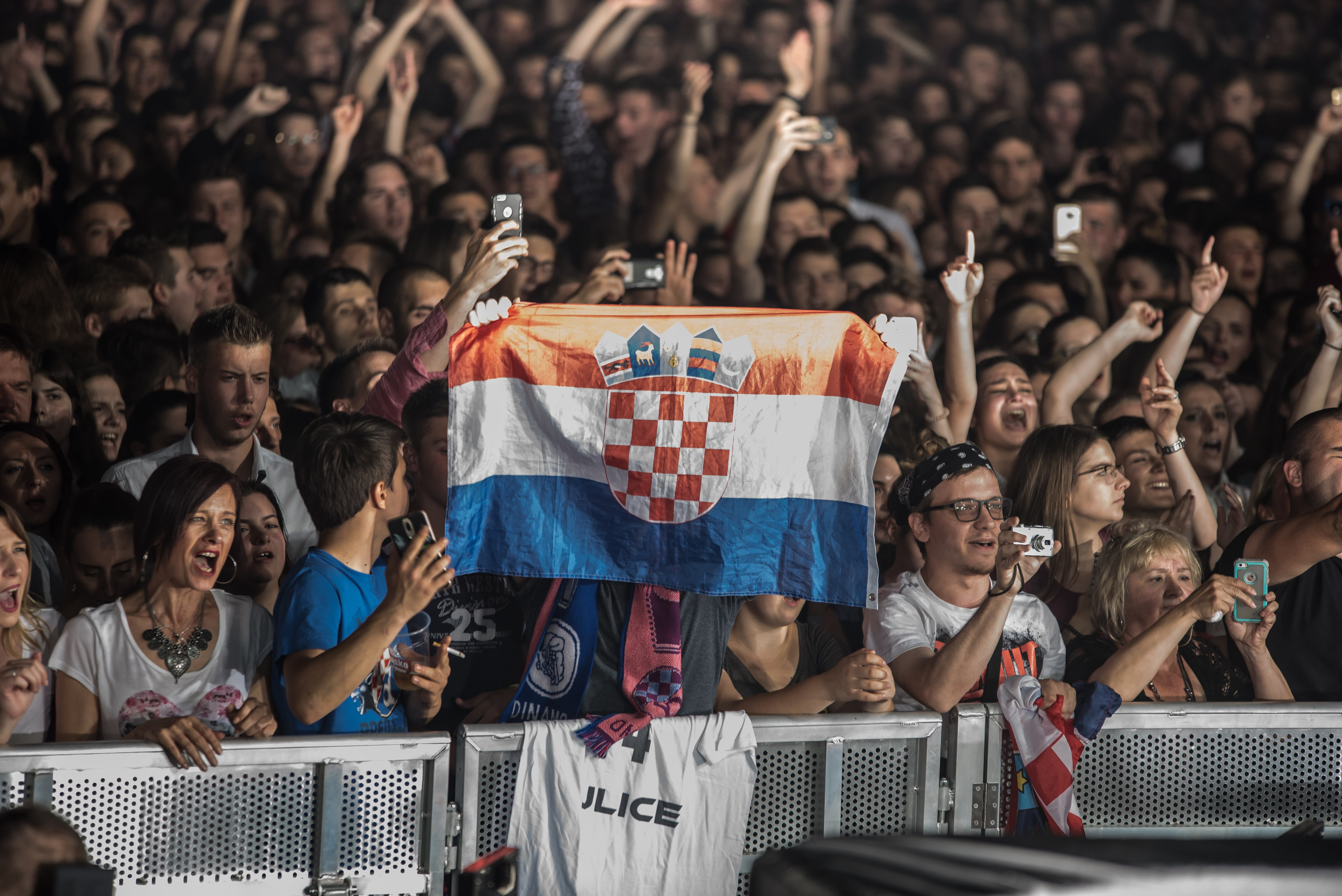 watching, fan - enthusiast, excitement, emotion, young adult, mobile phone, real people, yell, cheering, flag, seat, taking, photo, spectator, enjoyment, HD Wallpaper