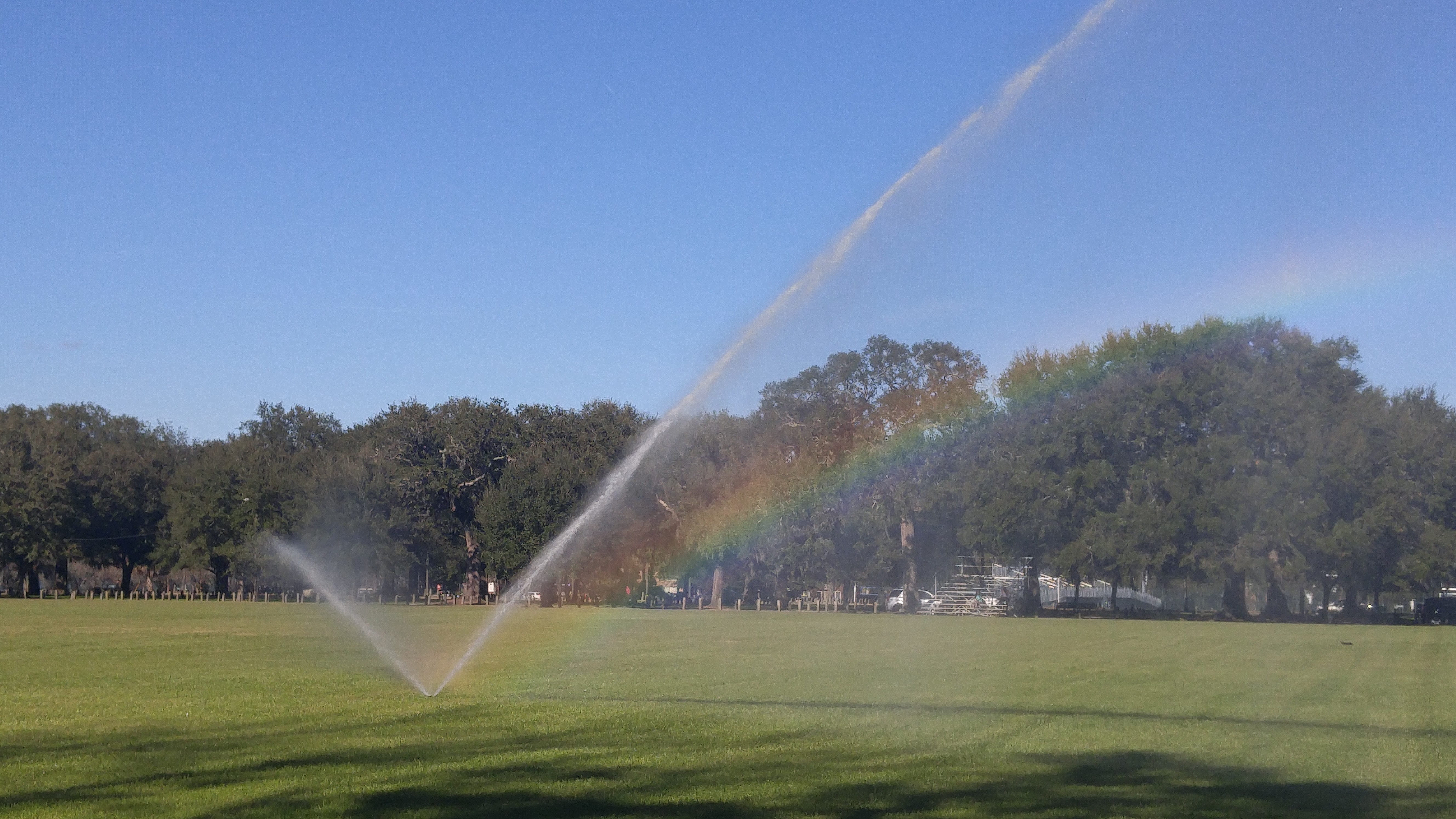 sport, summer, activity, nature, watering, outdoor, lawn, green color, Sprinkler, plant, landscape, tranquility, grass, field, water, beauty in nature, HD Wallpaper