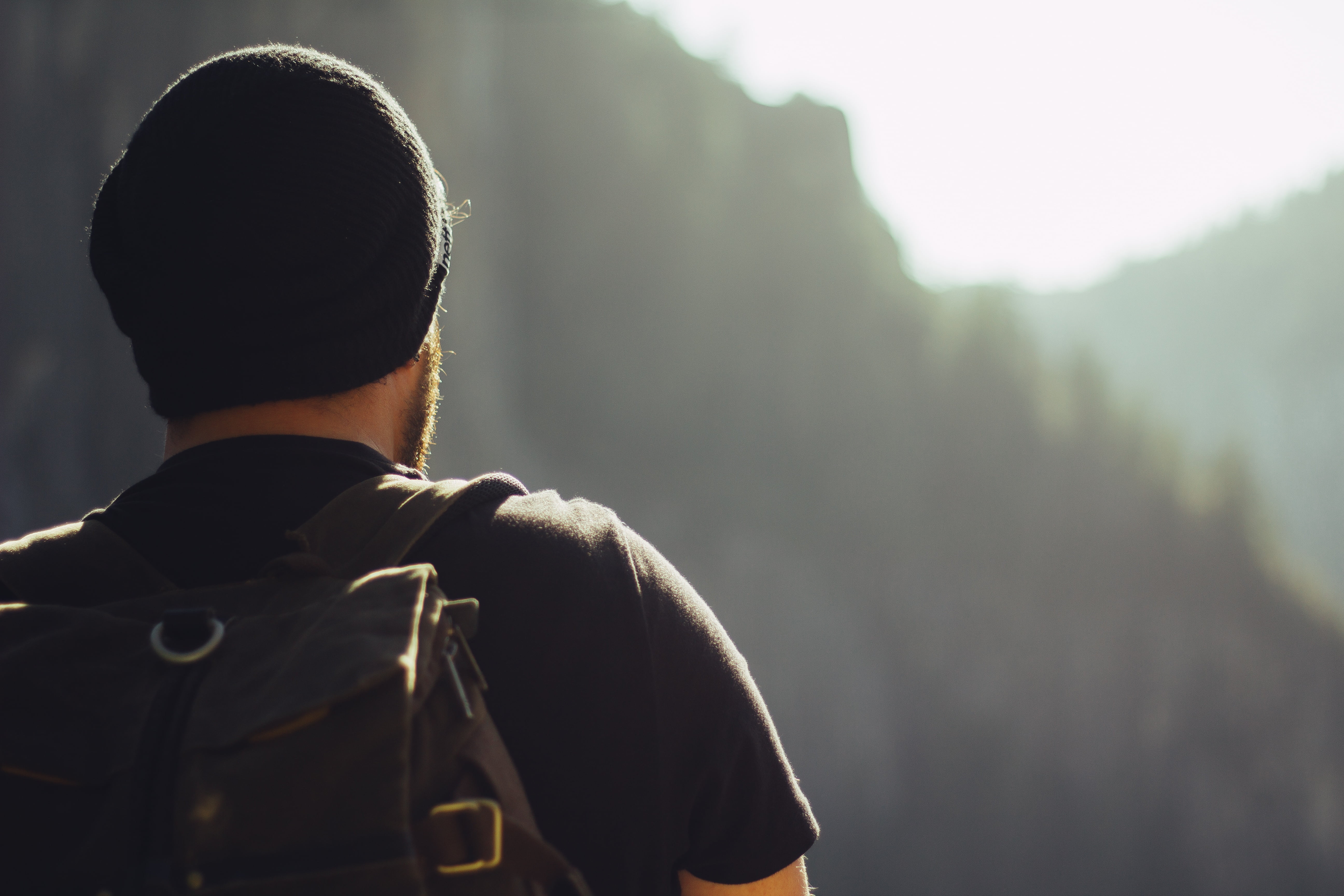 casual clothing, outdoors, hiking, waist up, adventure, headshot, one person, backpack, rear view, warm clothing, day, mountains, focus on foreground, men, HD Wallpaper