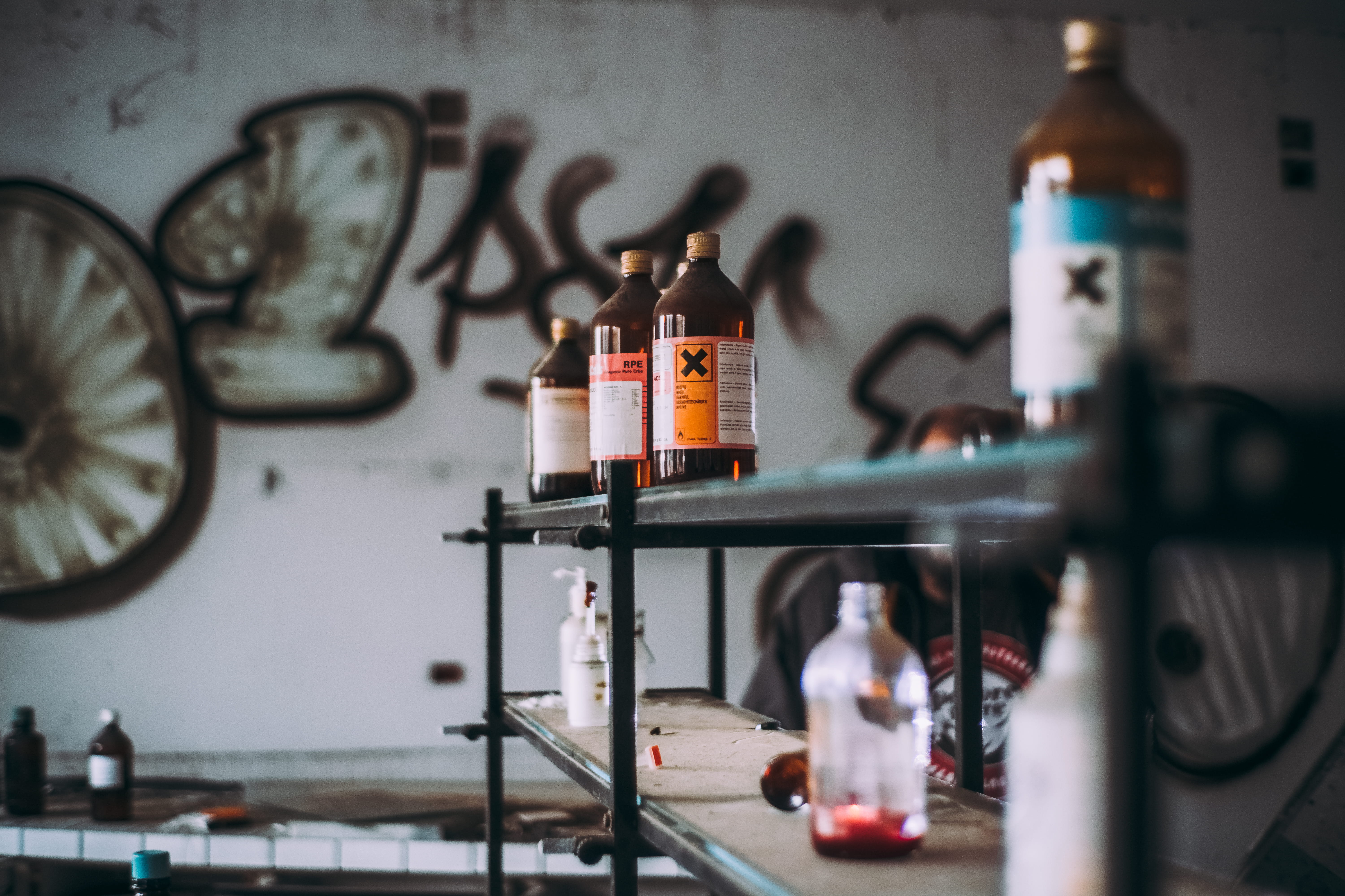 art and craft, building, room, toxin, close-up, graffiti, human representation, indoors, laboratory, bottle, shelf, daylight, selective focus, poison, liquid, HD Wallpaper