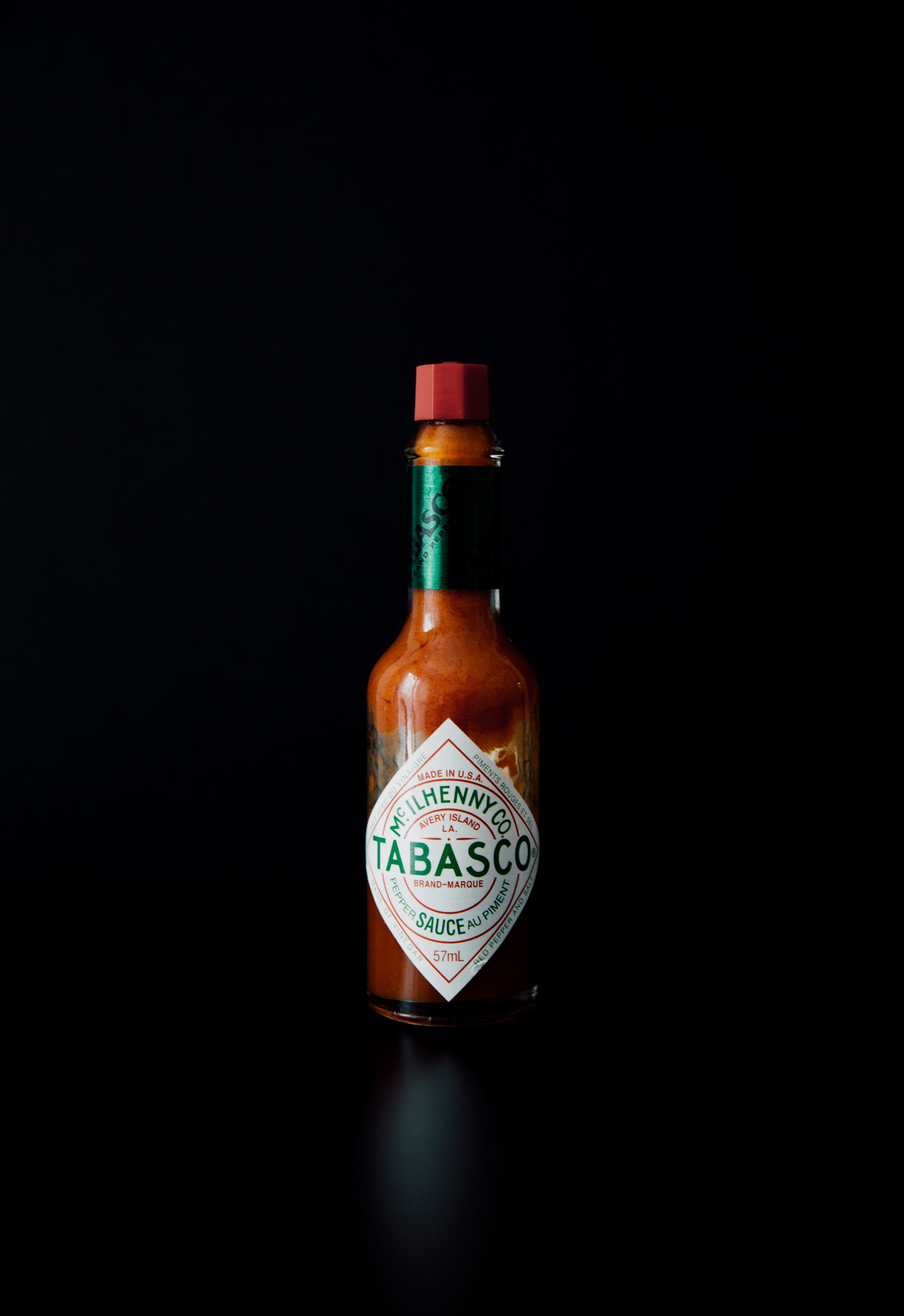 co, food and drink, tobasco, still life, perfume sprayer, indoors, glass - material, close-up, container, refreshment, tabasco, hot, wealth, spicy, no people, Phone HD Wallpaper