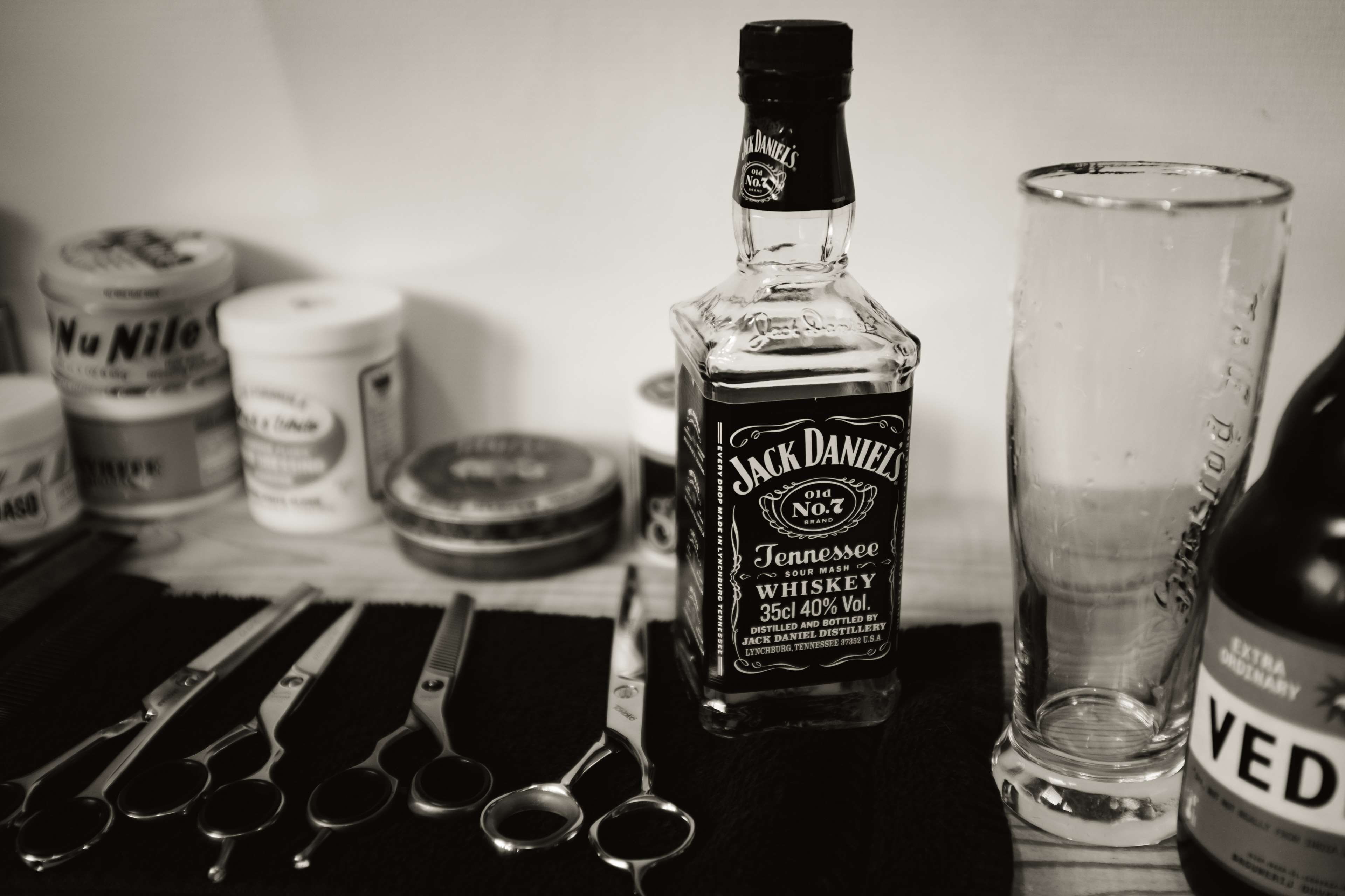 bottle, container, no people, drink, 4K, hairdresser, text, glass - material, still life, refreshment, table, group of objects, glass, indoors, transparent, HD Wallpaper