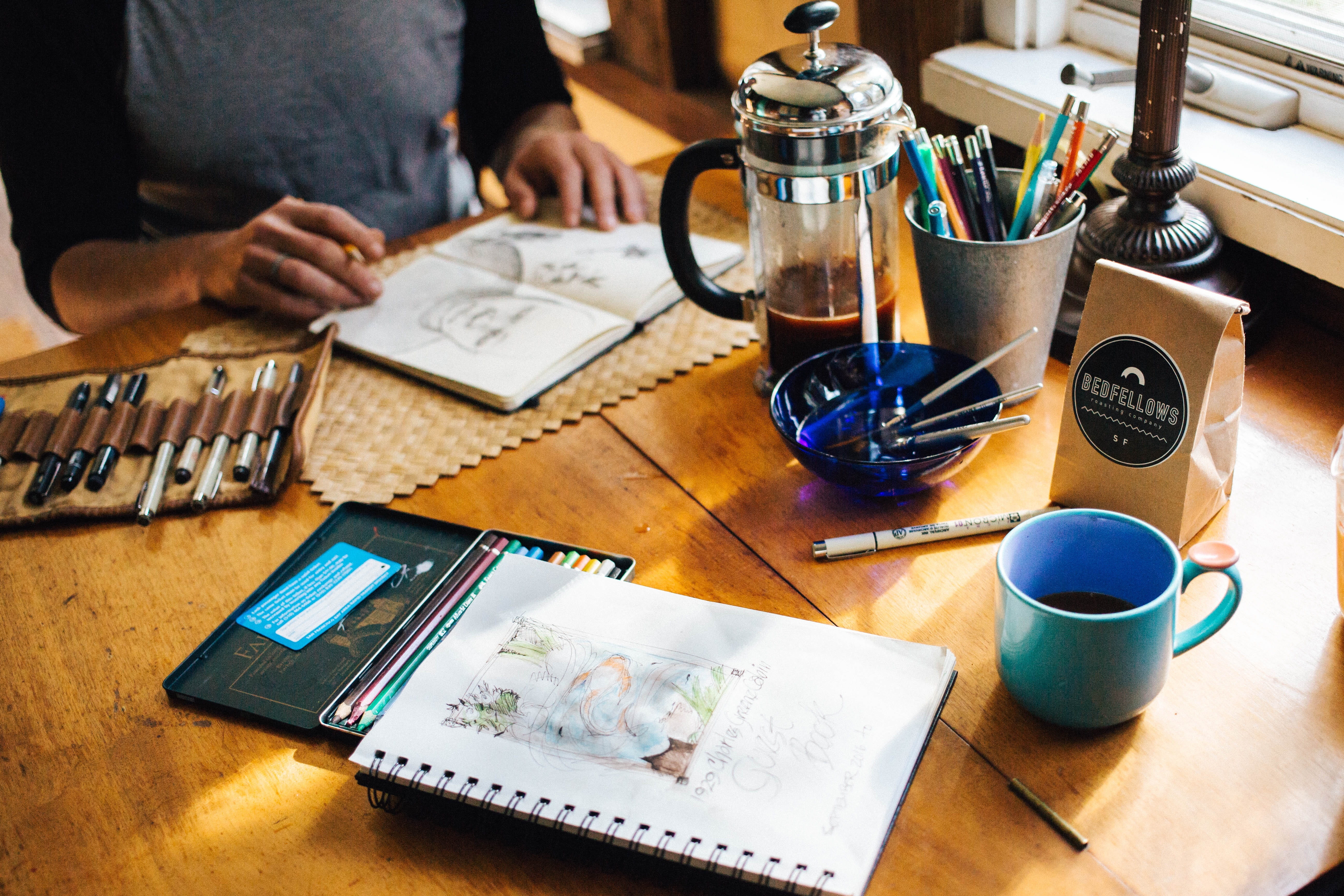 drawing, man, wireless technology, artist, food and drink, pens, mug, laptop, adult, wooden, communication, paper, high angle view, one person, paint, press, HD Wallpaper