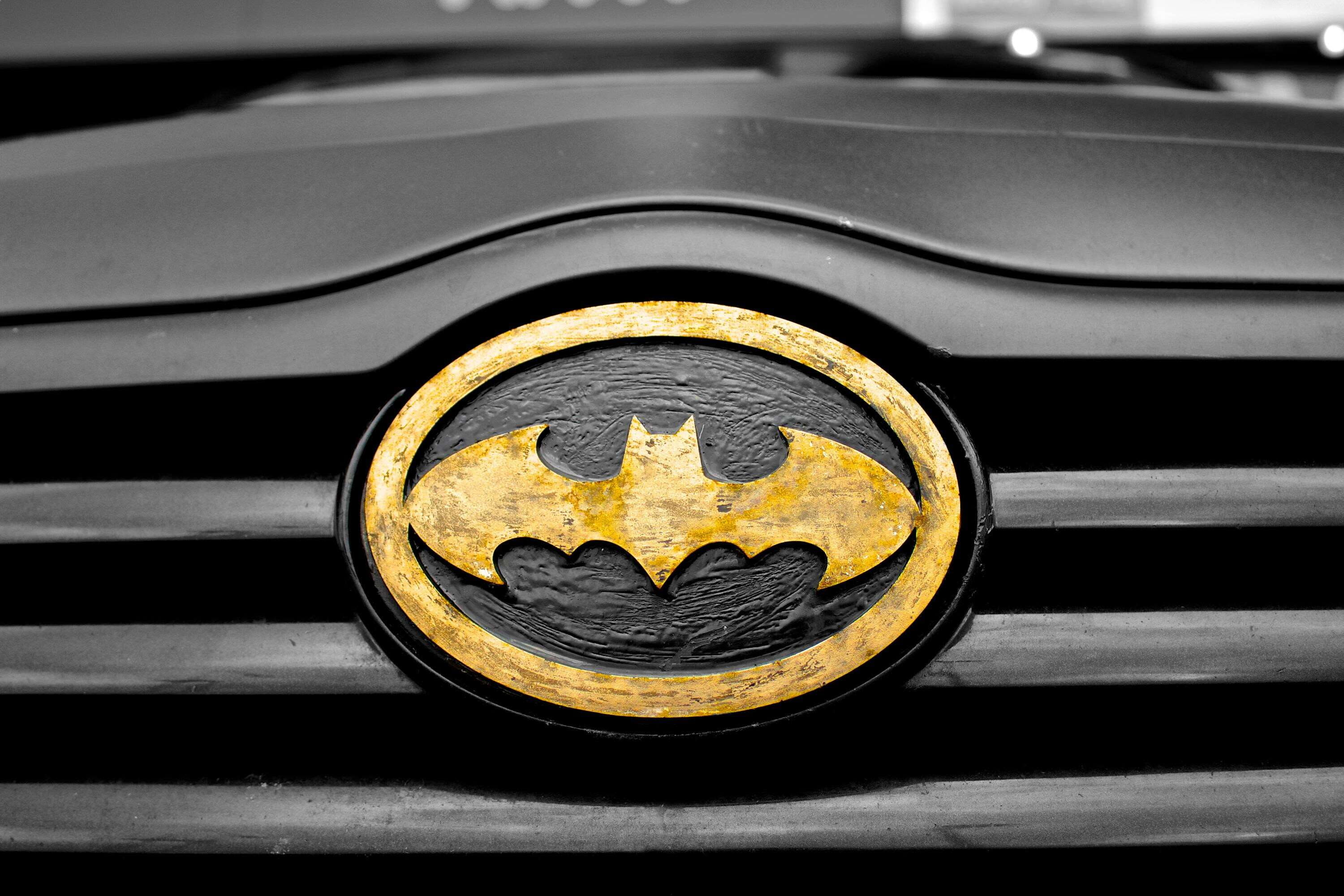 shape, backgrounds, metal, finance, logo, 2K, representation, black color, wheel, batman, car, no people, gold colored, superhero, full frame, hero, symbol, HD Wallpaper