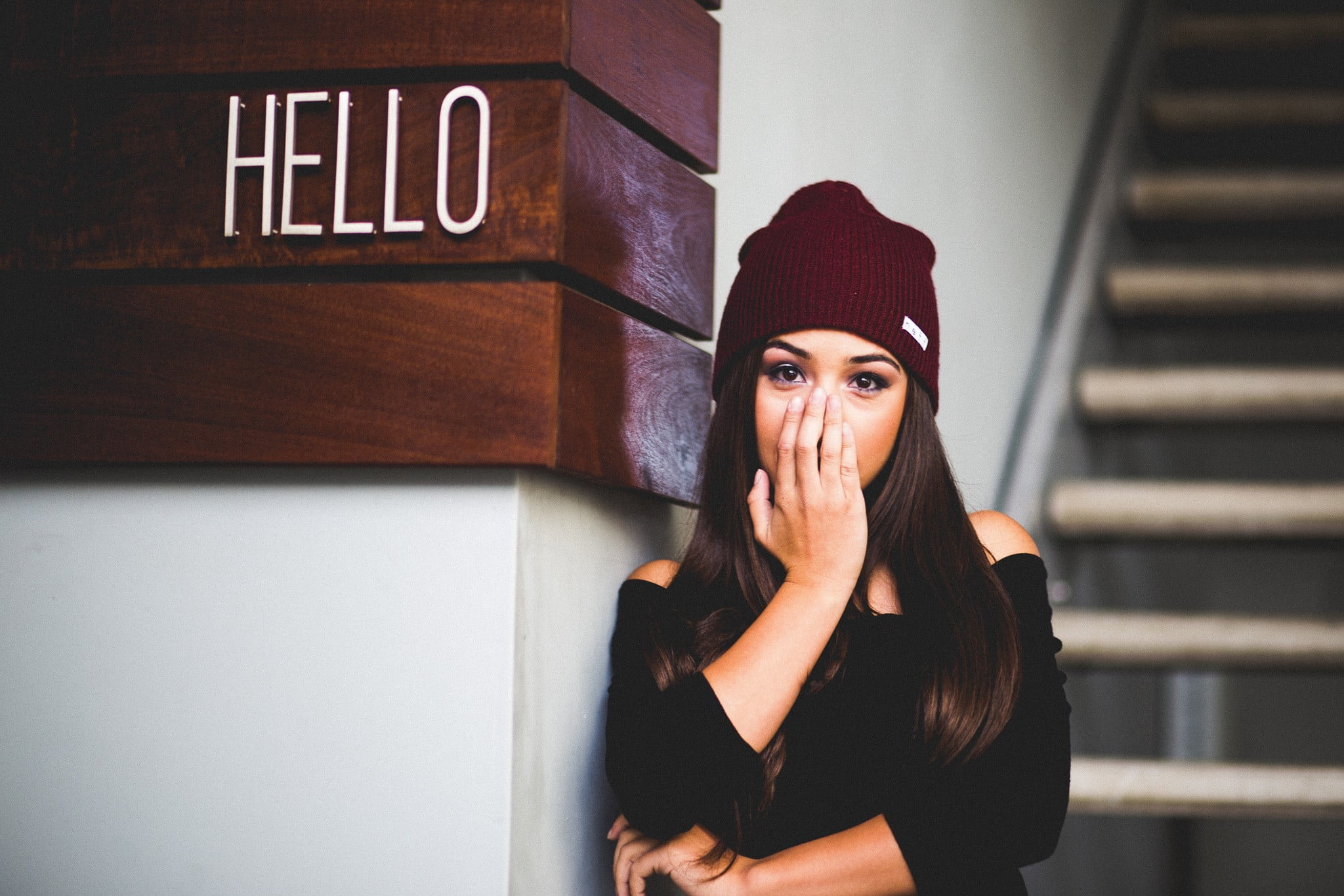 clothing, lifestyles, looking at camera, waiting, Hector Camacho, headshot, young adult, looking, women, hair, adult, indoors, hands covering mouth, one person, HD Wallpaper