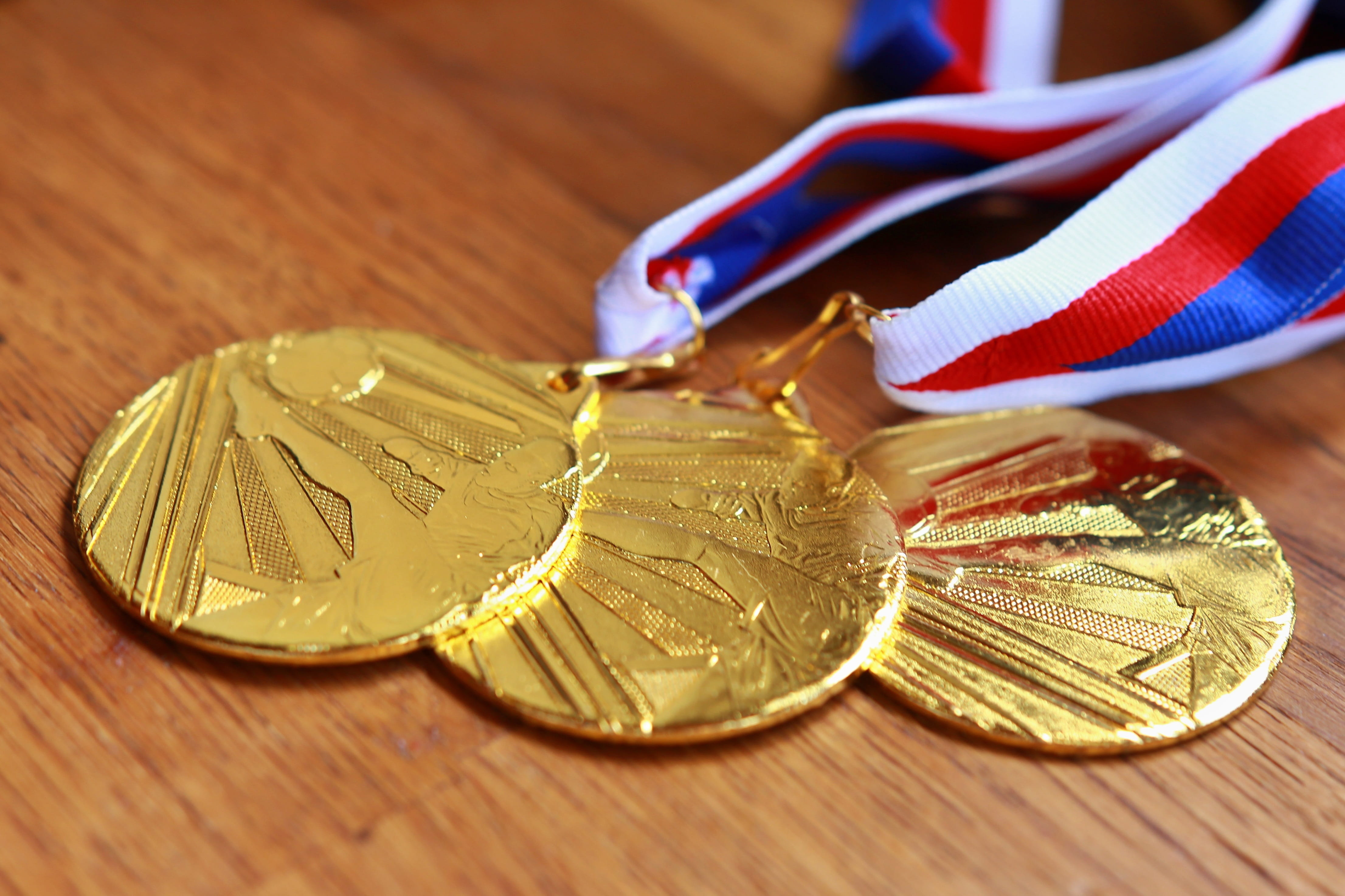 one person, indoors, selective focus, target, still life, savings, metal, wood - material, game, close-up, winner, match, business, wealth, gold colored, HD Wallpaper