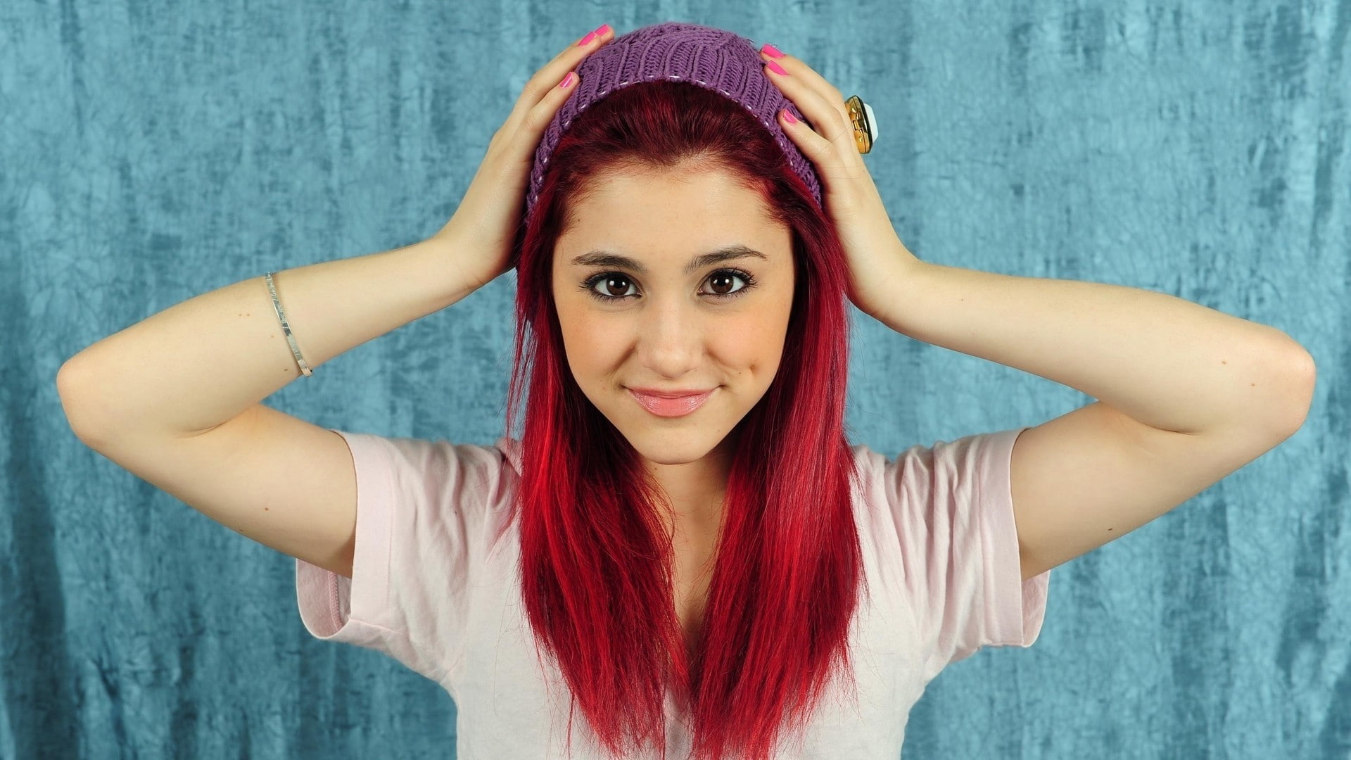 woolly hat, brown eyes, smiling, knit hat, Ariana Grande, 1080P, redhead, women, hands on head, HD Wallpaper