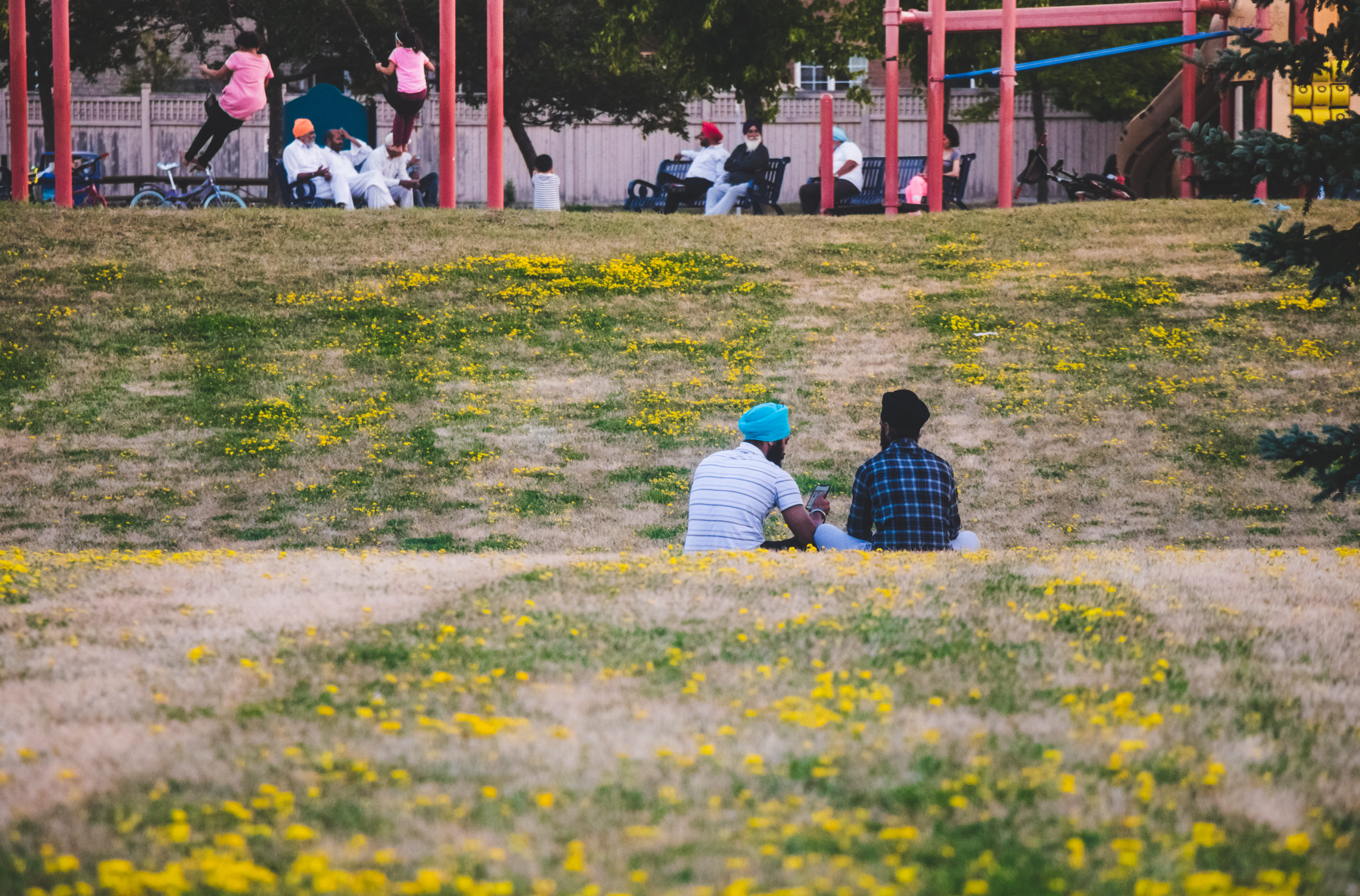 landscape, day, girls, plant, real people, turban, wear, sitting, flowers, leisure activity, growth, 5K, park, playground, outdoors, rear view, men, group of people, HD Wallpaper