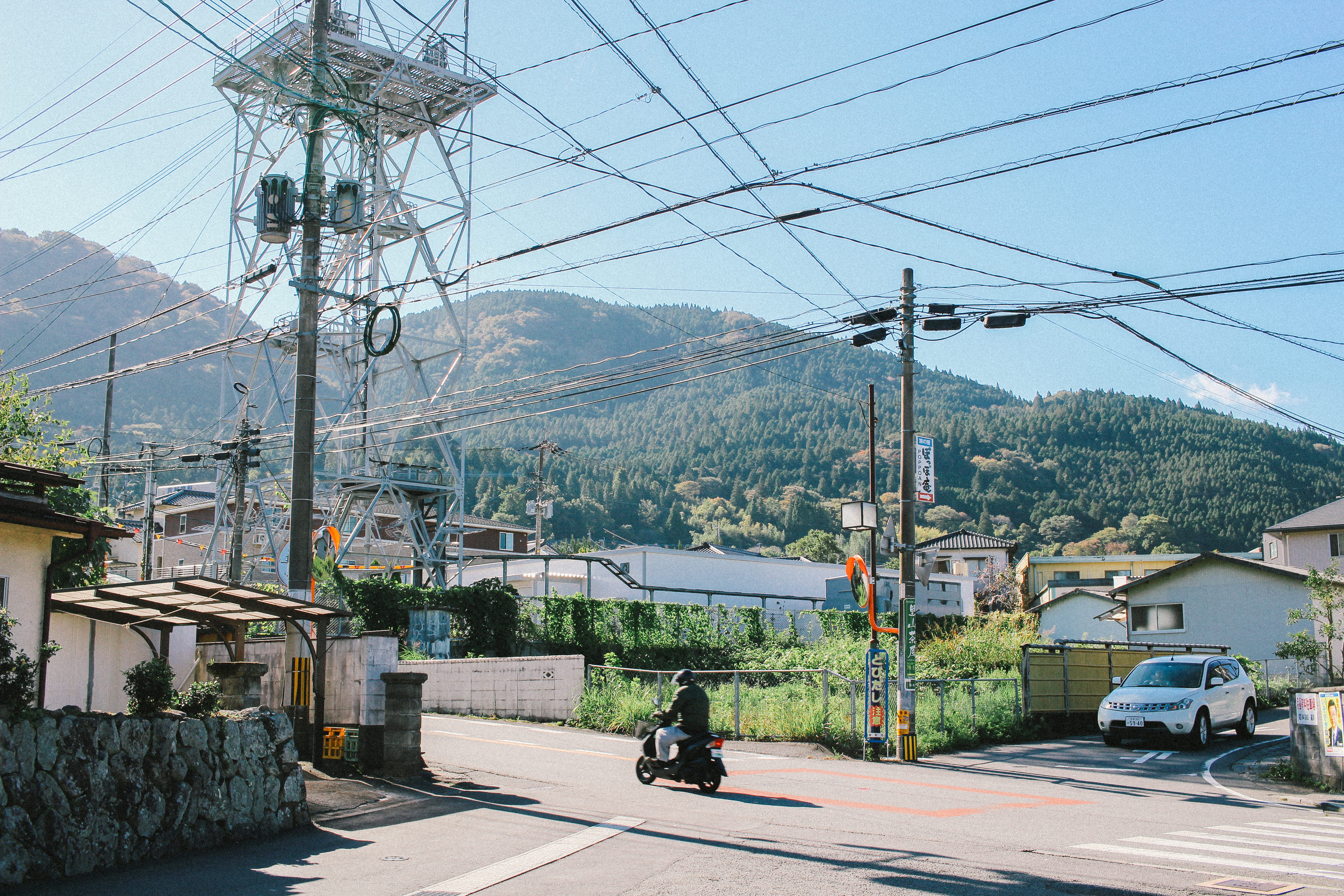person, fuel and power generation, wheel, architecture, 5K, riding, power line, human, asphalt, no people, electricity, street, built structure, fukuoka, HD Wallpaper