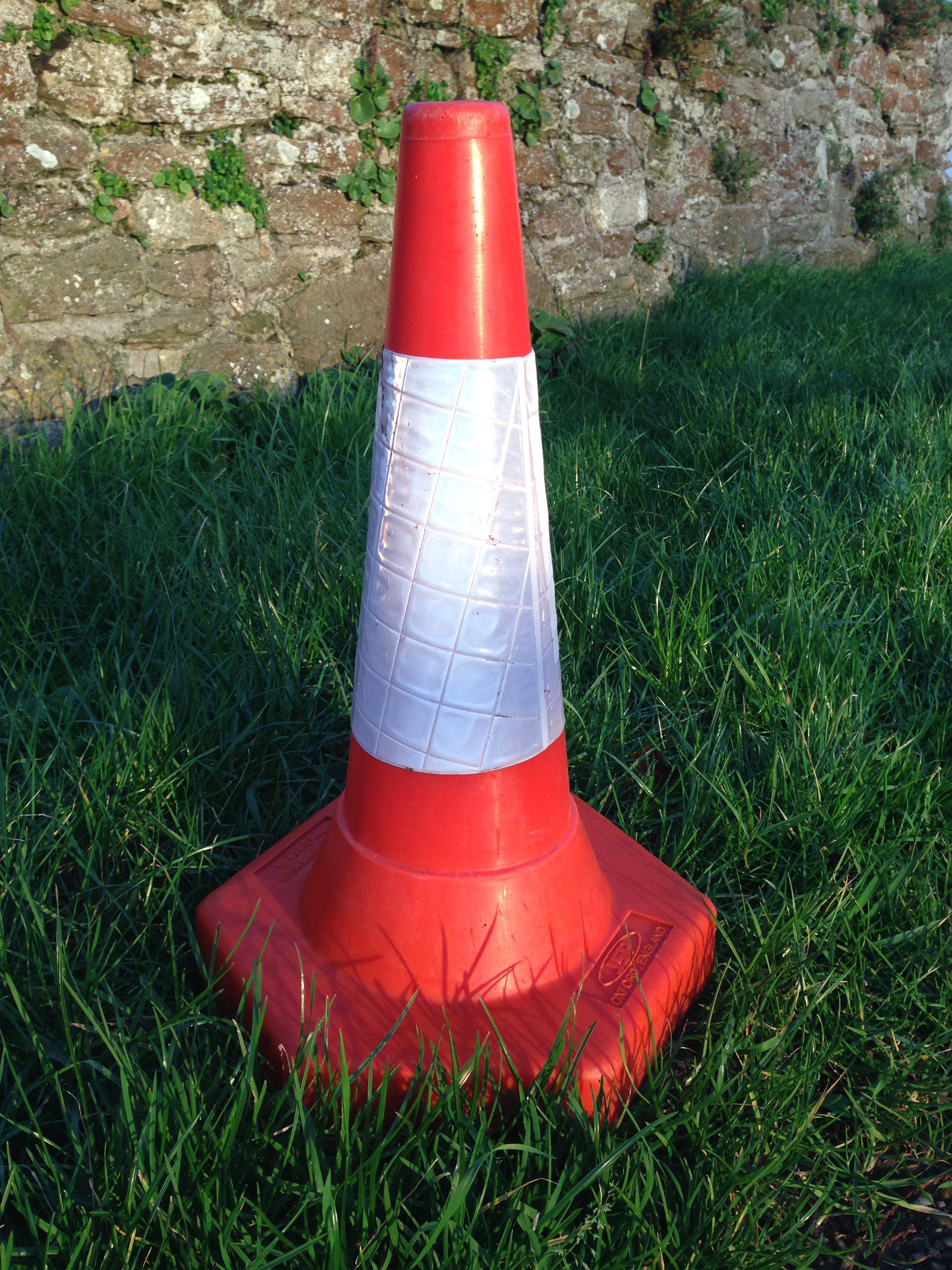 cone, grass, traffic cone, safety, 2K, traffic, field, sign, protection, orange color, outdoors, guidance, nature, plant, land, red, road, green color, Phone HD Wallpaper