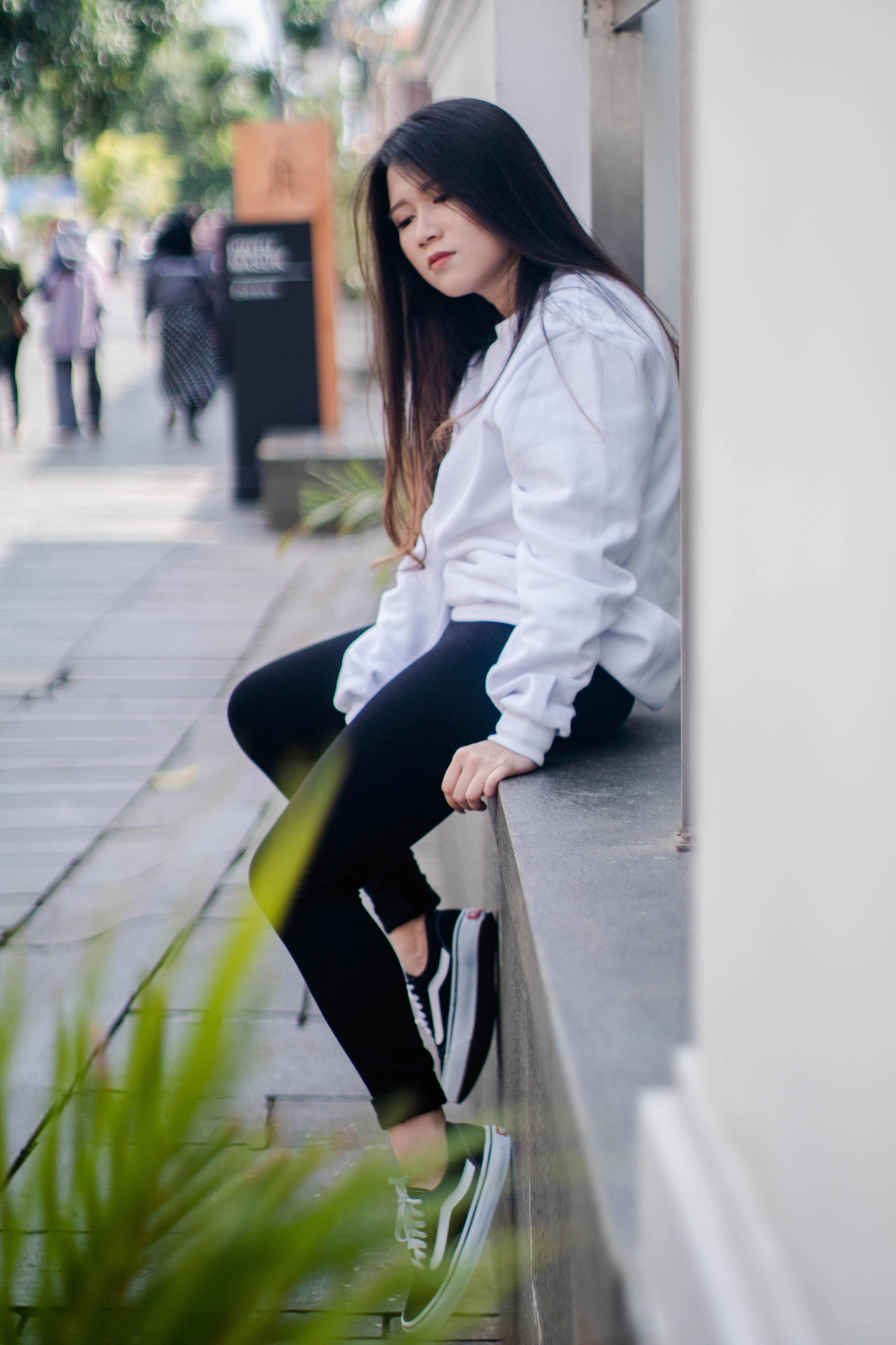 long hair, potraits, 5K, black and white, casual clothing, day, girl, outdoors, street, architecture, outfit, young women, contemplation, adult, built structure, Phone HD Wallpaper